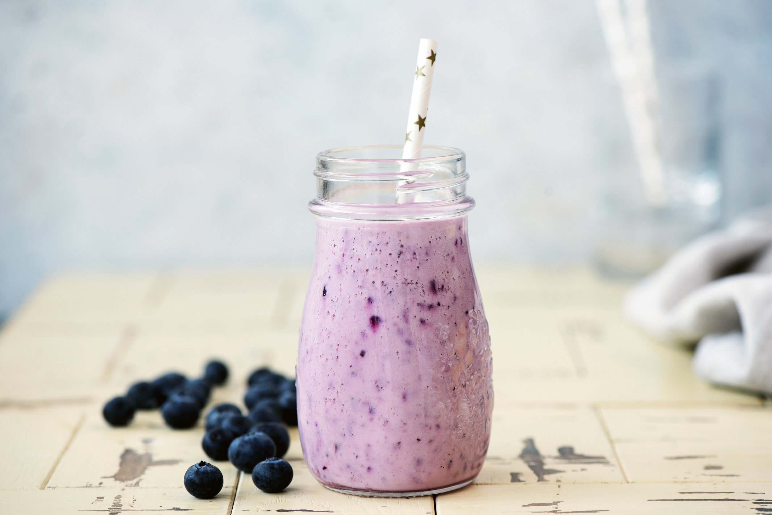 bigstock-Blueberry-Smoothie-In-Bottle-W-306714862.jpg