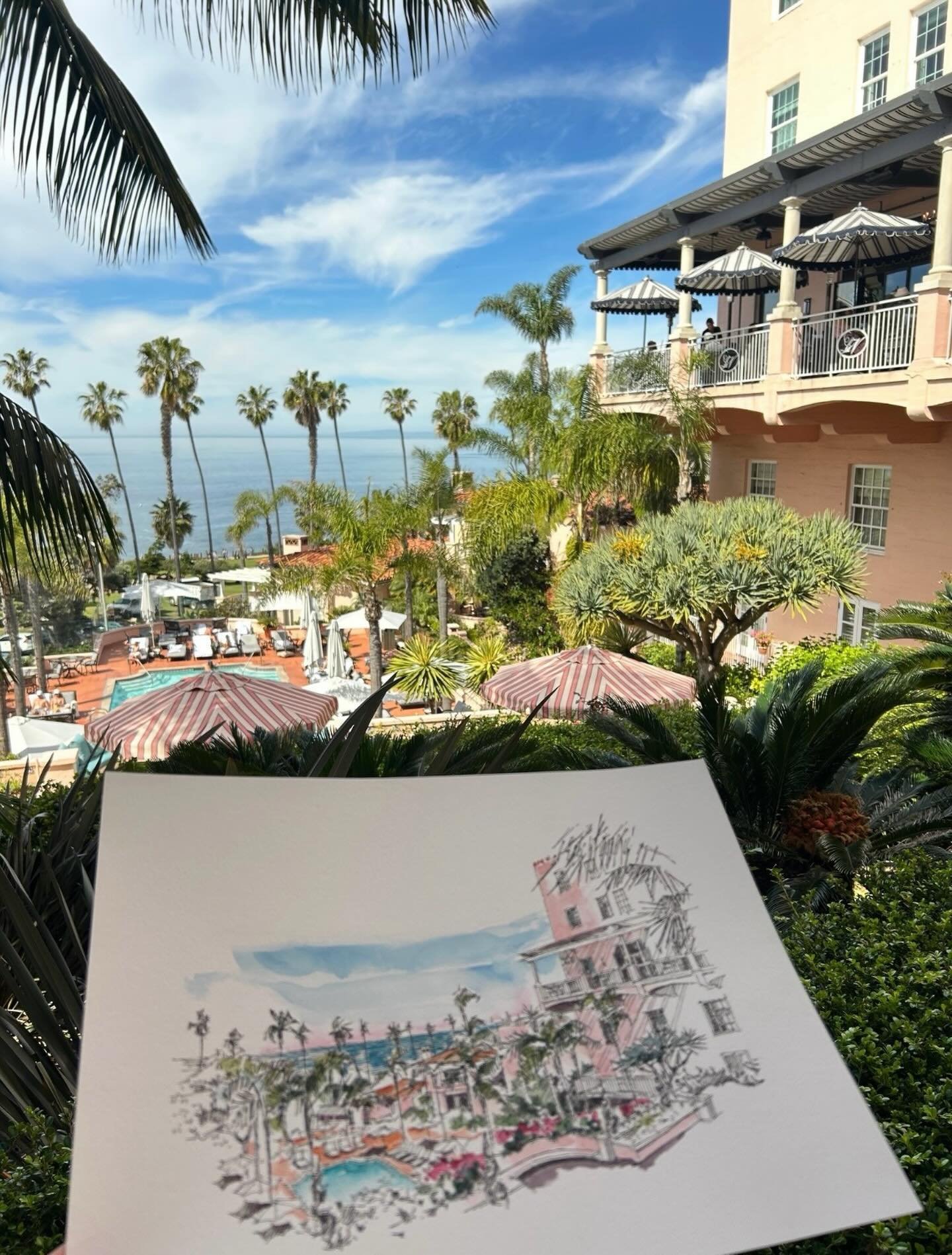 View at La Valencia Hotel looking out to the pool and the Pacific Ocean beyond. Ink and watercolor created in collaboration with the hotel, shown here with the finished piece held in front of the scene.

@lavalenciahotel
#LaValenciaHotel #LaJolla #Ca