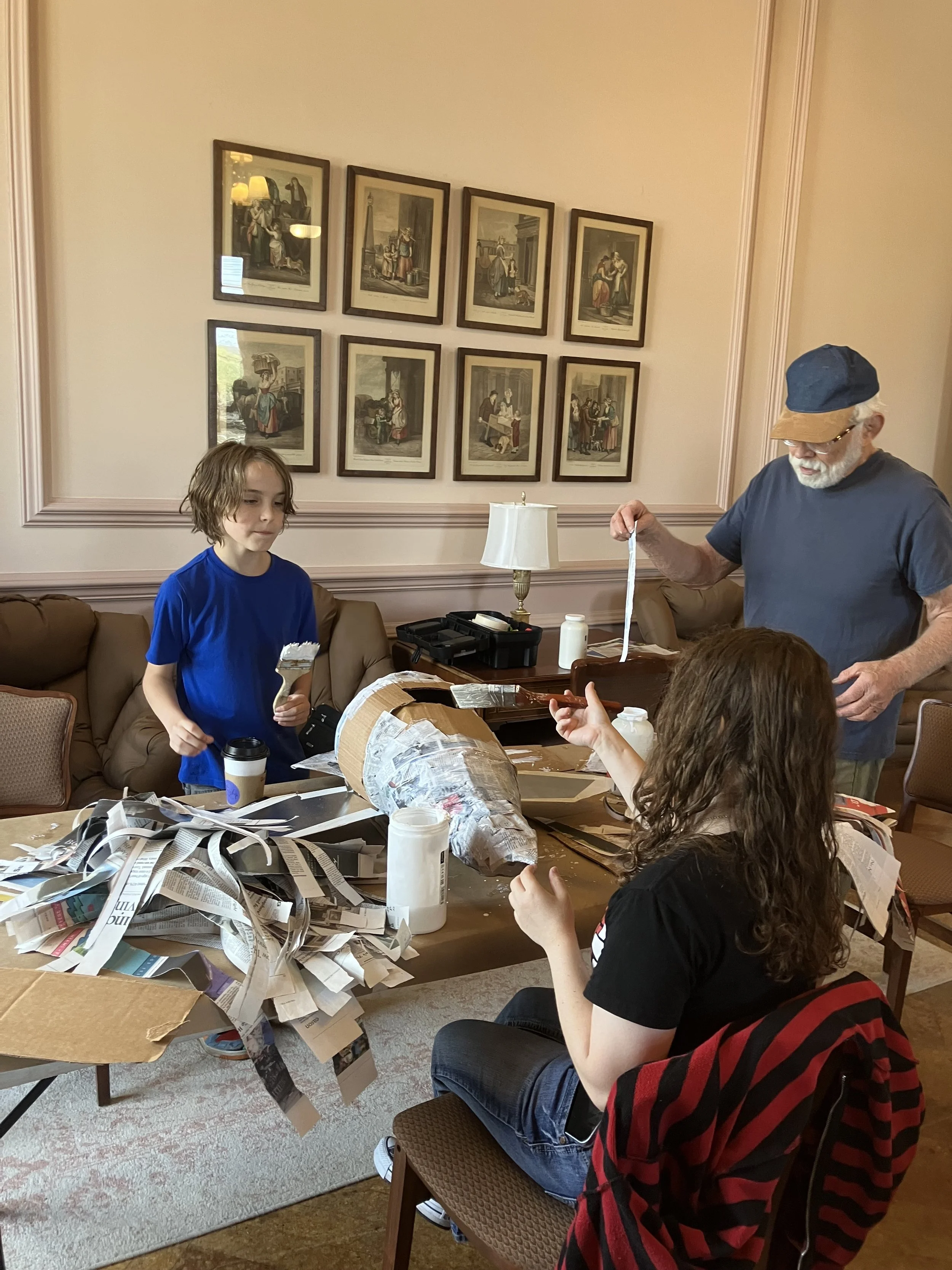 Images from a "bird puppet building" workshop organized by the Babcock Theatre Preservation Society. 5 out of the 9 birds in this exhibition were co-created by  the community. The birds and buffalo puppet will be exhibited at the Wellsville Christmas