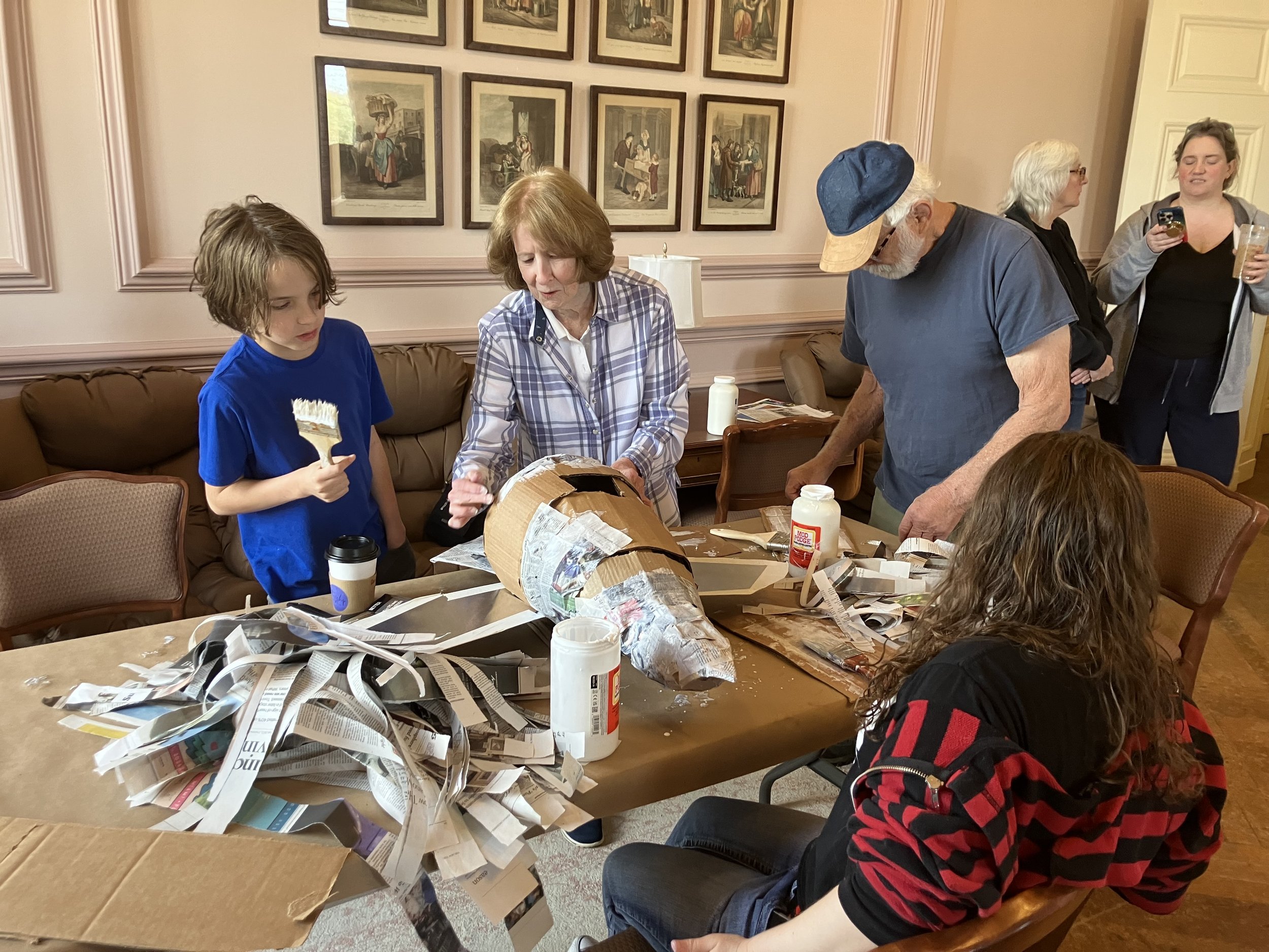 Images from a "bird puppet building" workshop organized by the Babcock Theatre Preservation Society. 5 out of the 9 birds in this exhibition were co-created by  the community. The birds and buffalo puppet will be exhibited at the Wellsville Christmas