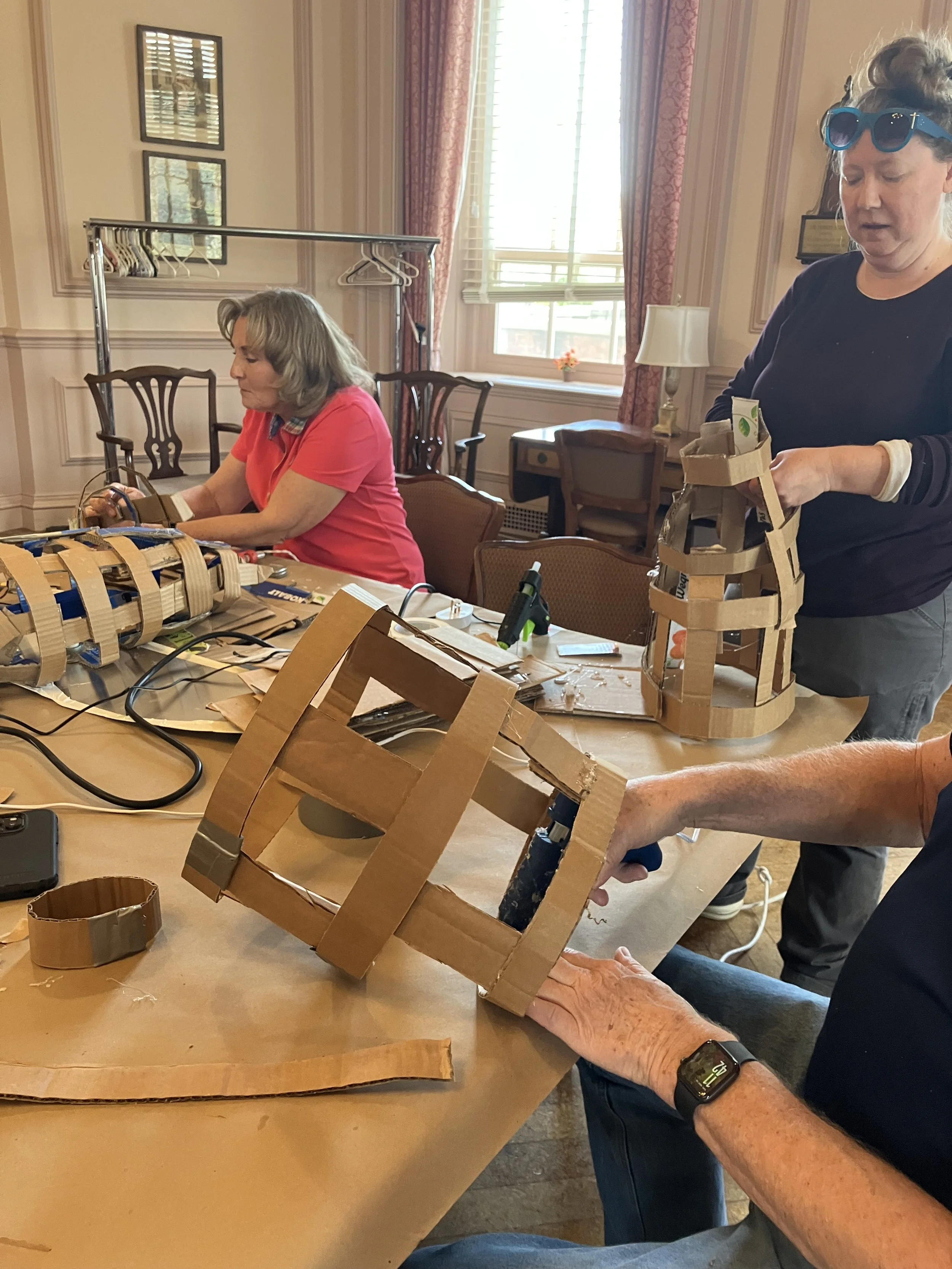 Images from a "bird puppet building" workshop organized by the Babcock Theatre Preservation Society. 5 out of the 9 birds in this exhibition were co-created by  the community. The birds and buffalo puppet will be exhibited at the Wellsville Christmas