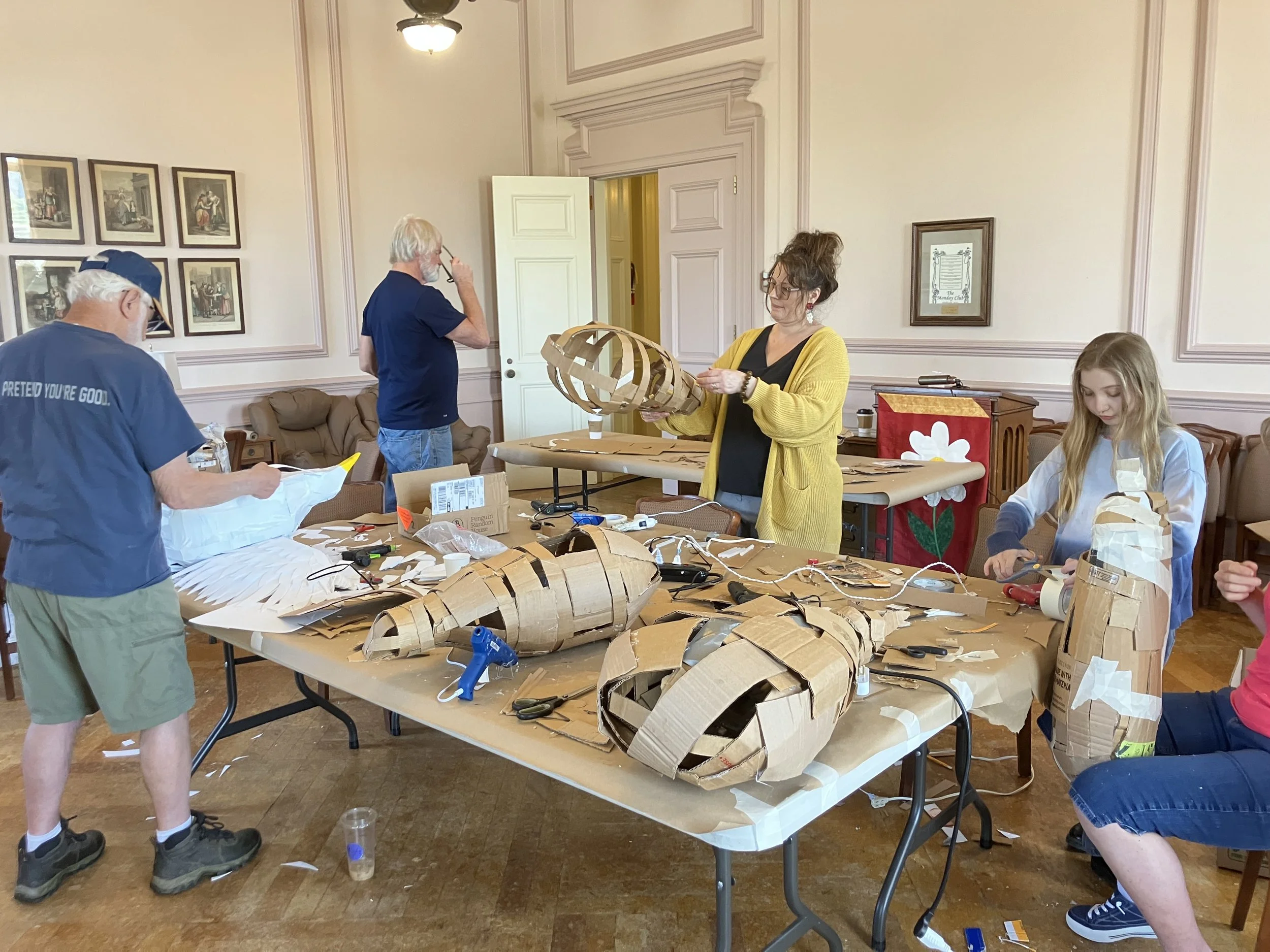 Images from a "bird puppet building" workshop organized by the Babcock Theatre Preservation Society. 5 out of the 9 birds in this exhibition were co-created by  the community. The birds and buffalo puppet will be exhibited at the Wellsville Christmas