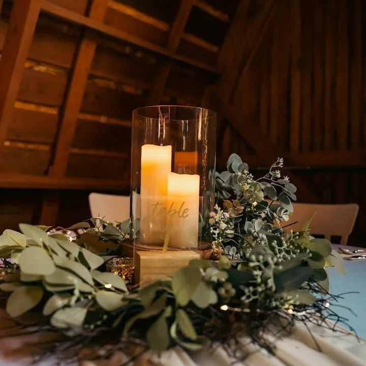 Wood Riser:Glass Hurricane:Candles:Greenery:Acrylic Table Number.jpg
