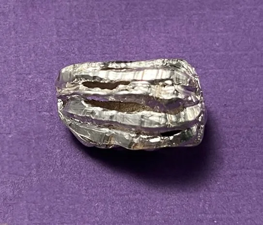 silver bead as it came from the caster