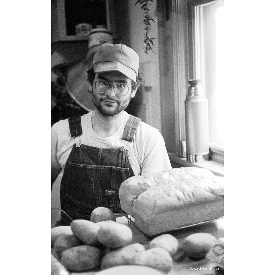 Nate and his freshly baked bread in the kitchen of the co-op we lived at in Madison. WI, 1995.

**