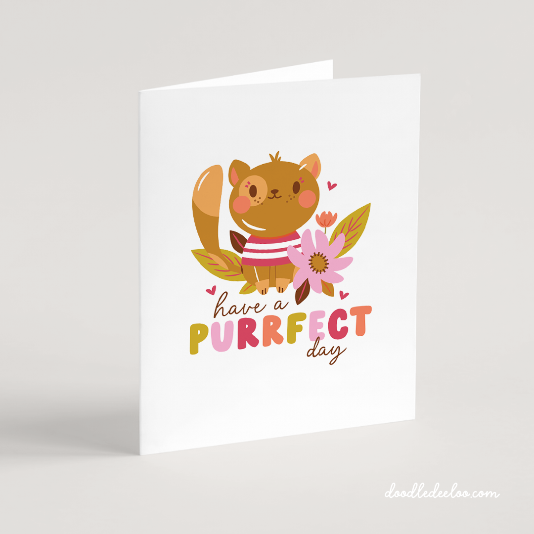 Cute Kawaii Cat And Flowers Illustrated Card With Hand-Drawn Type That Reads “Have A Purrfect Day.” Colors Are Pink, Burgundy and Green With A Brown Calico Cat in A red And White Striped Tee Shirt.
