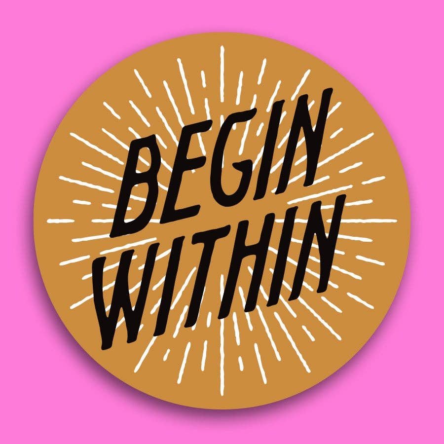Gold Round “Begin Within” Vinyl Sticker With Starburst Design In White Behind Black Hand Drawn Modern Type. Approximately 3 Inches Diameter.