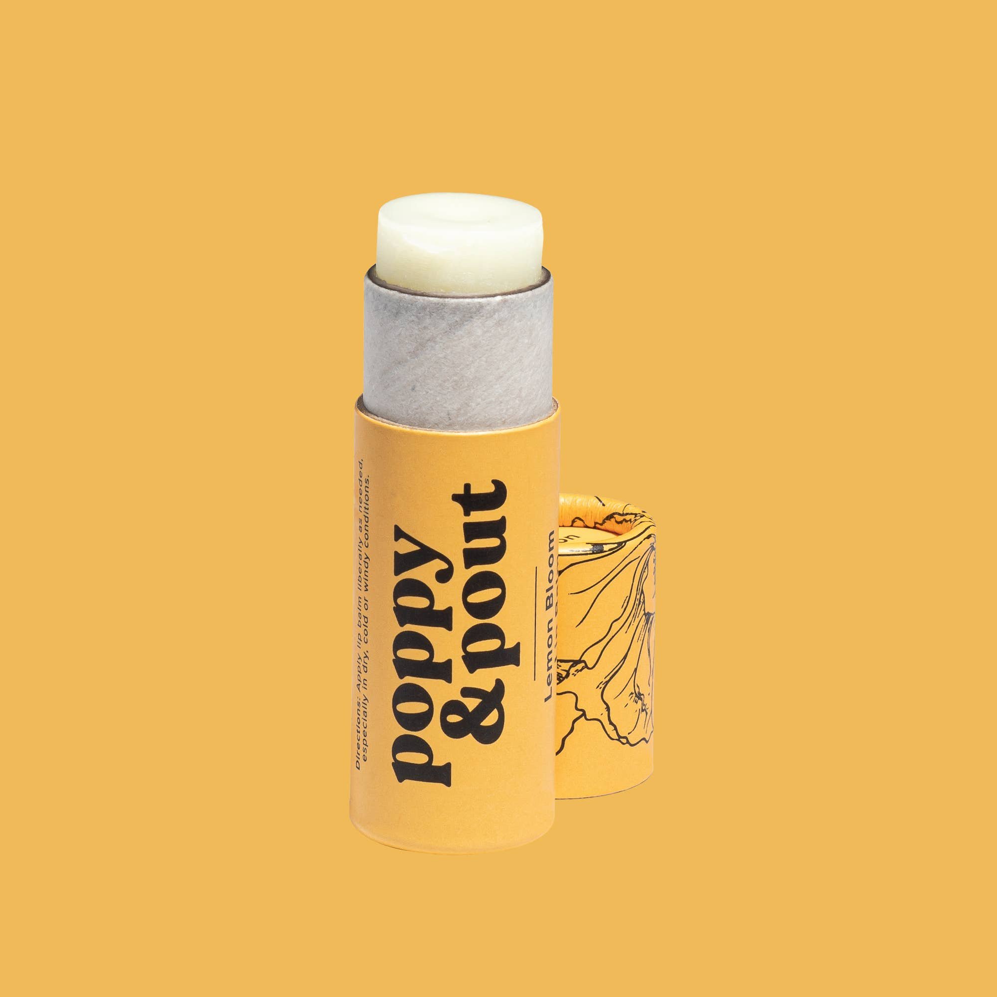 Image Of A Tube Of 100% Natural Poppy And Pout Lemon Bloom Lip Balm In A Yellow Eco-Friendly Cardboard Tube.