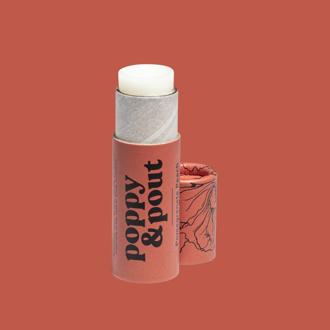 Image Of 100% Natural Poppy And Pout Pomegranate Peach Lip Balm In A Rose Pink Eco-Friendly Cardboard Tube.
