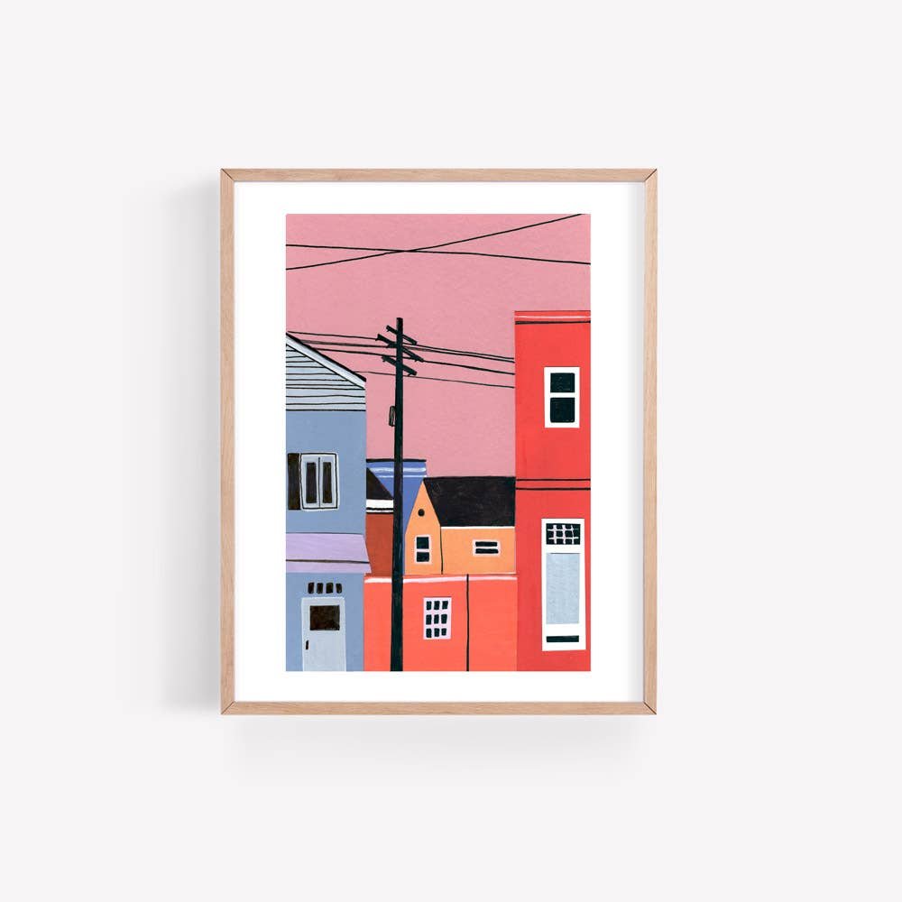 Image Of Illustrated City Sunset Art Print With Stacked Houses In Pink, Blue And Orange With Pink Background.