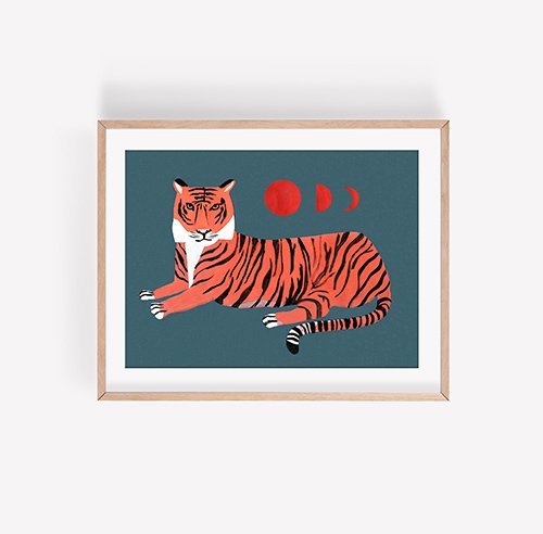Image Of Lucky Tiger Colorful Illustrated Art Print By Kristen Solecki. Print Features A Prone Orange Tiger With Deep Red Orange Moon Phases On A Deep Green Blue Background.