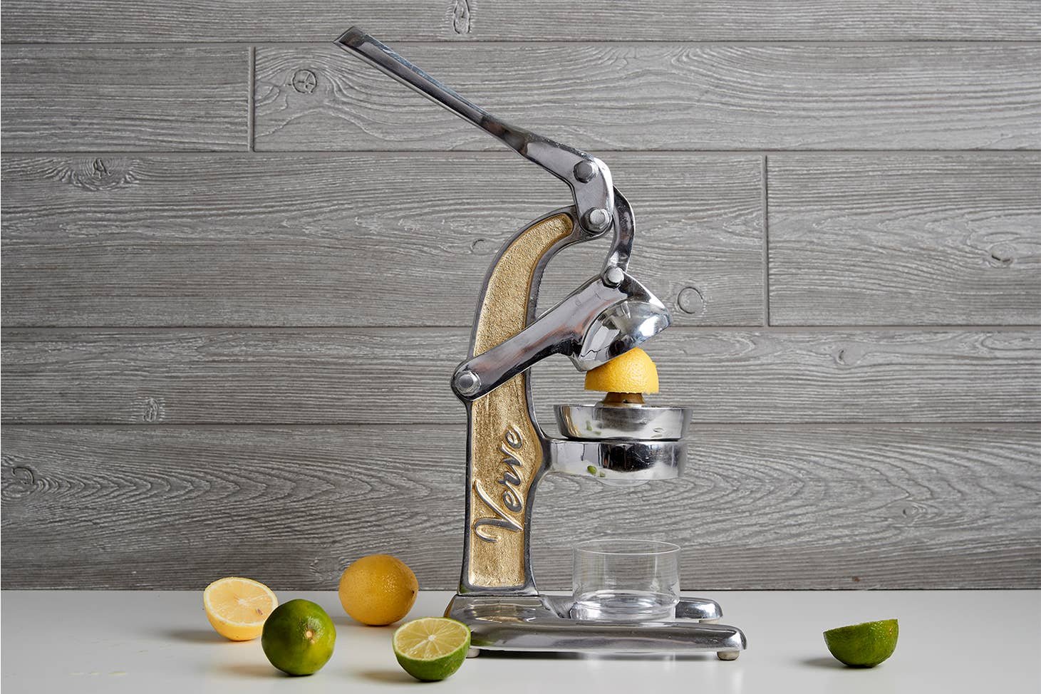 Image Of Mexico Market Style Metal Citrus Juicer In Cast Aluminum With Gold Accent. Hand Lever Action. Easy Clean.