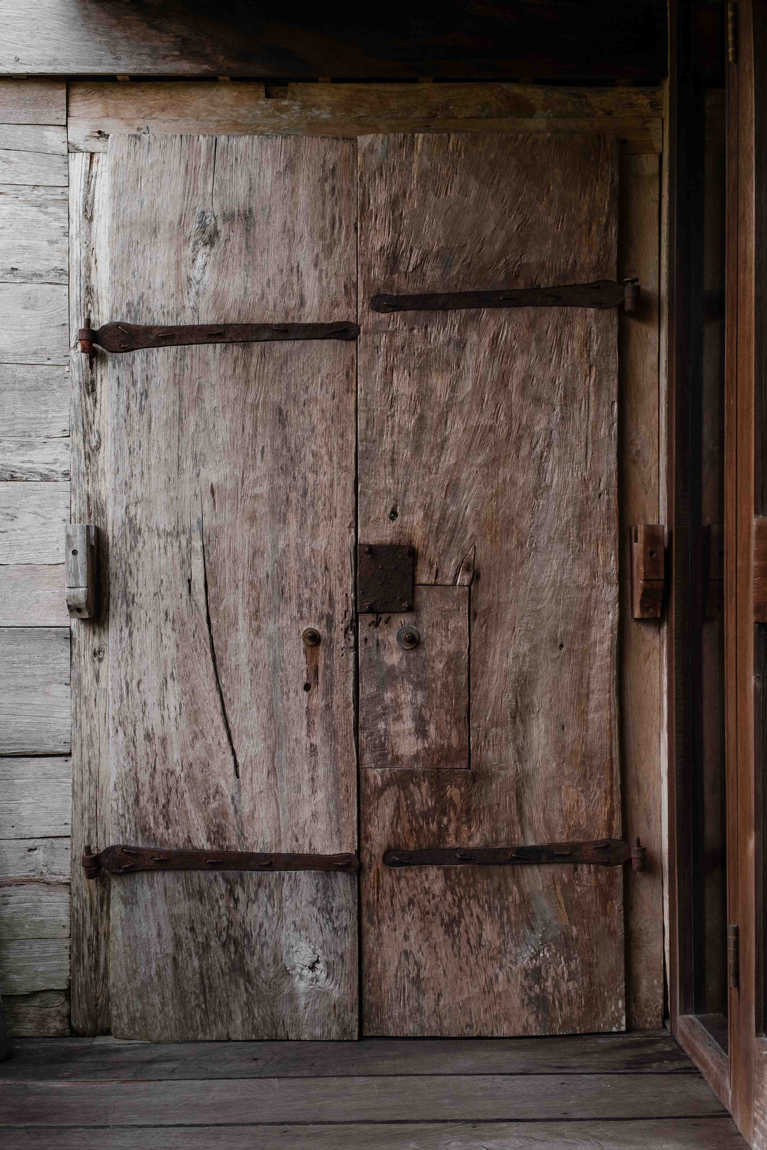 Rustic Wooden Door at Rumah Hujan Estate in Ubud Bali photographed by Anna Tetzner