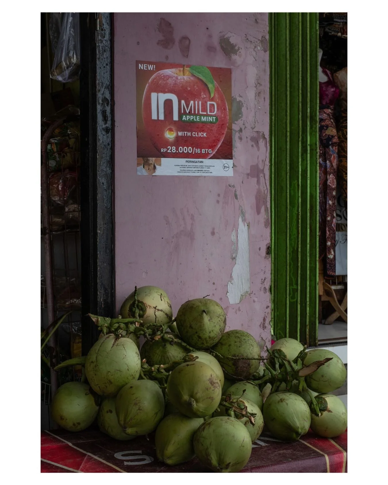 Coconuts &amp; cigarettes. Kintamani, Bali. March 2026
