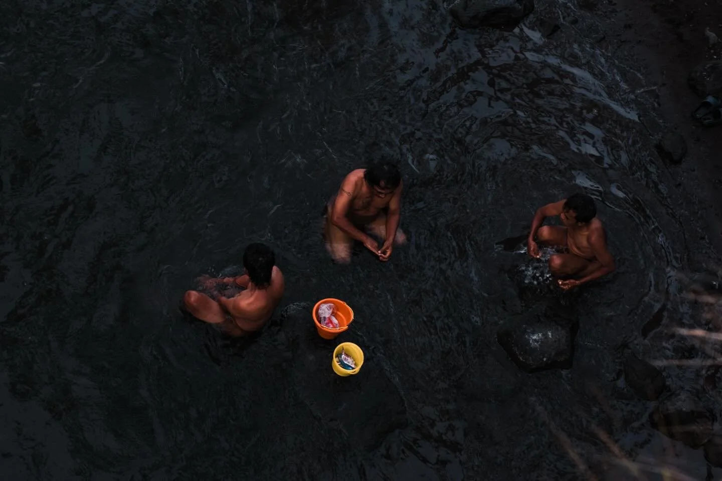 Bathing men. Sidemen, Bali. March 2026
