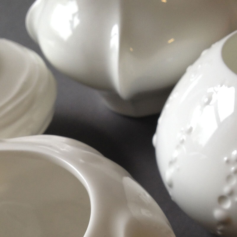 Tealight Holder - White, glazed bone china tealight holders in four designs; Finn, Urchin, Star & Iris.