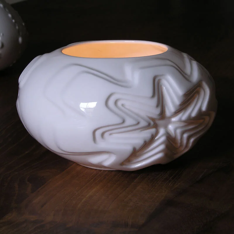 Tealight Holder - A white, glazed bone china tealight holder in the Star design.