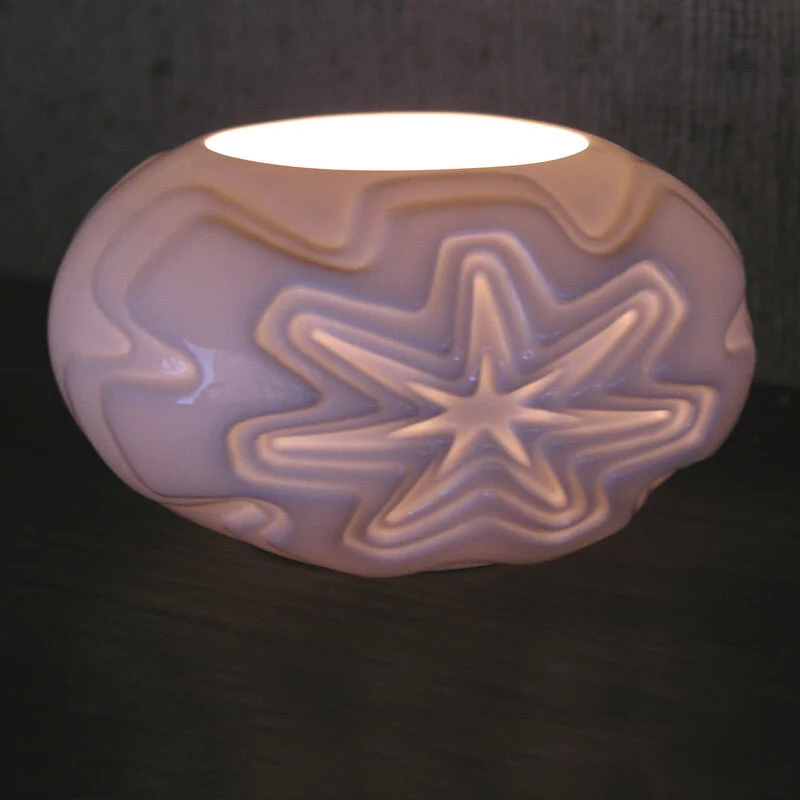 Tealight Holder - A white, glazed bone china tealight holder in the Star design.