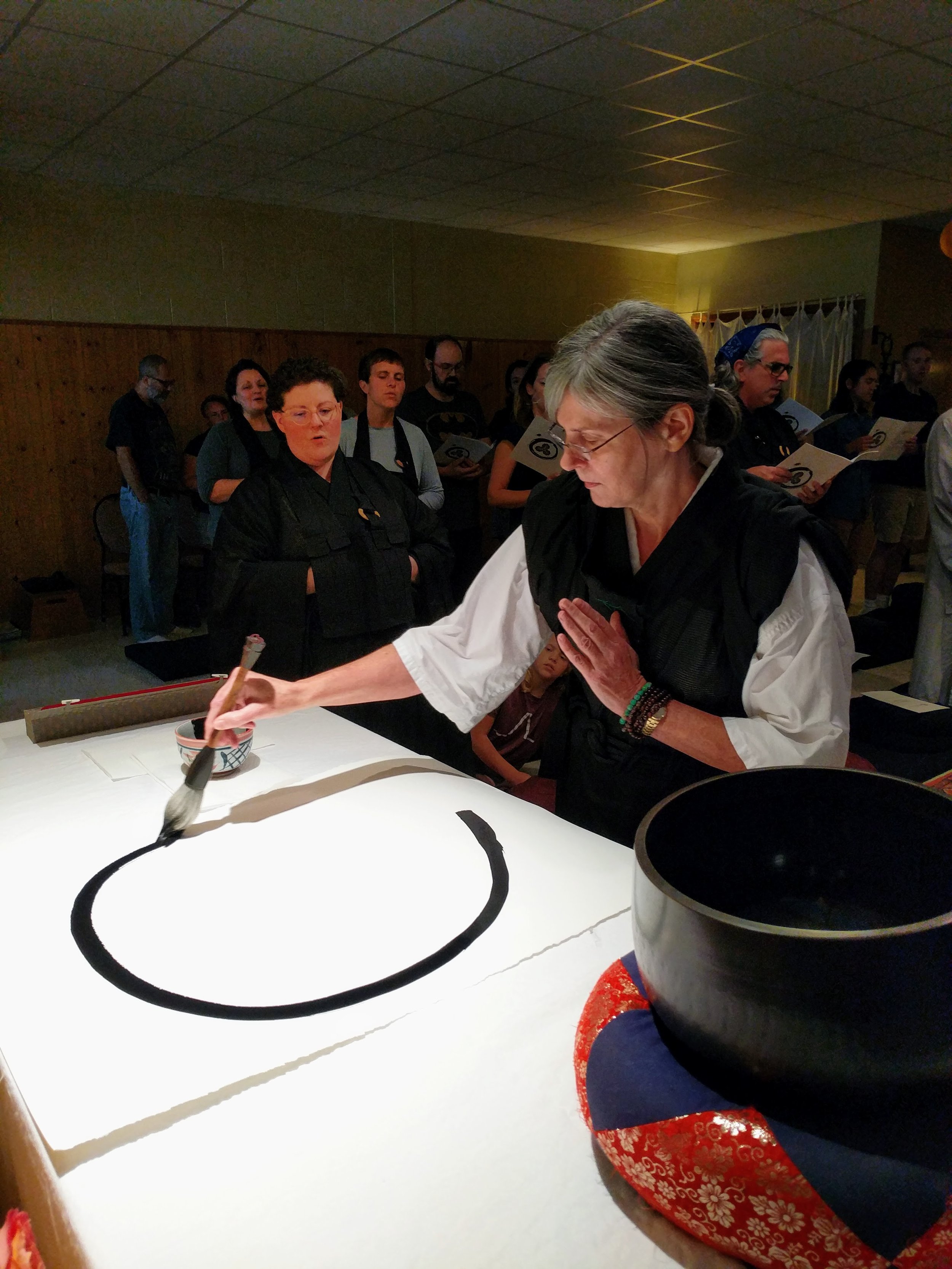  Shokai draws the enso at Fall Ango Opening in 2019. 