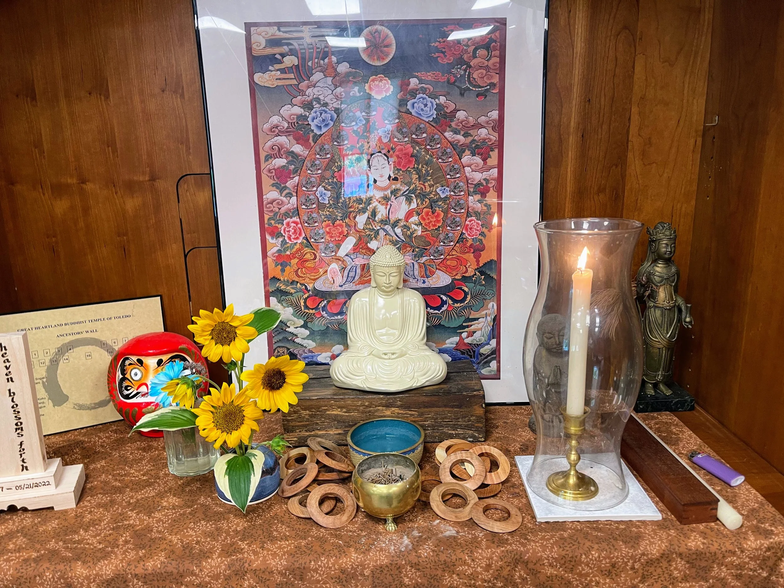 Buddhist altar with rakusu rings.