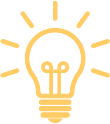 Illustration of a glowing light bulb with rays of light emanating from it.