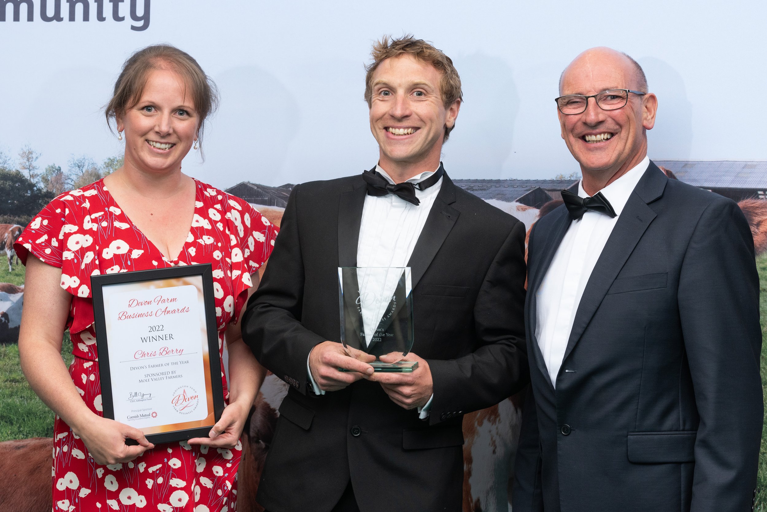Chris Berry with Graeme Cock and wife Sarah for Devon's Farmer of the Year sponsored by Mole Valley