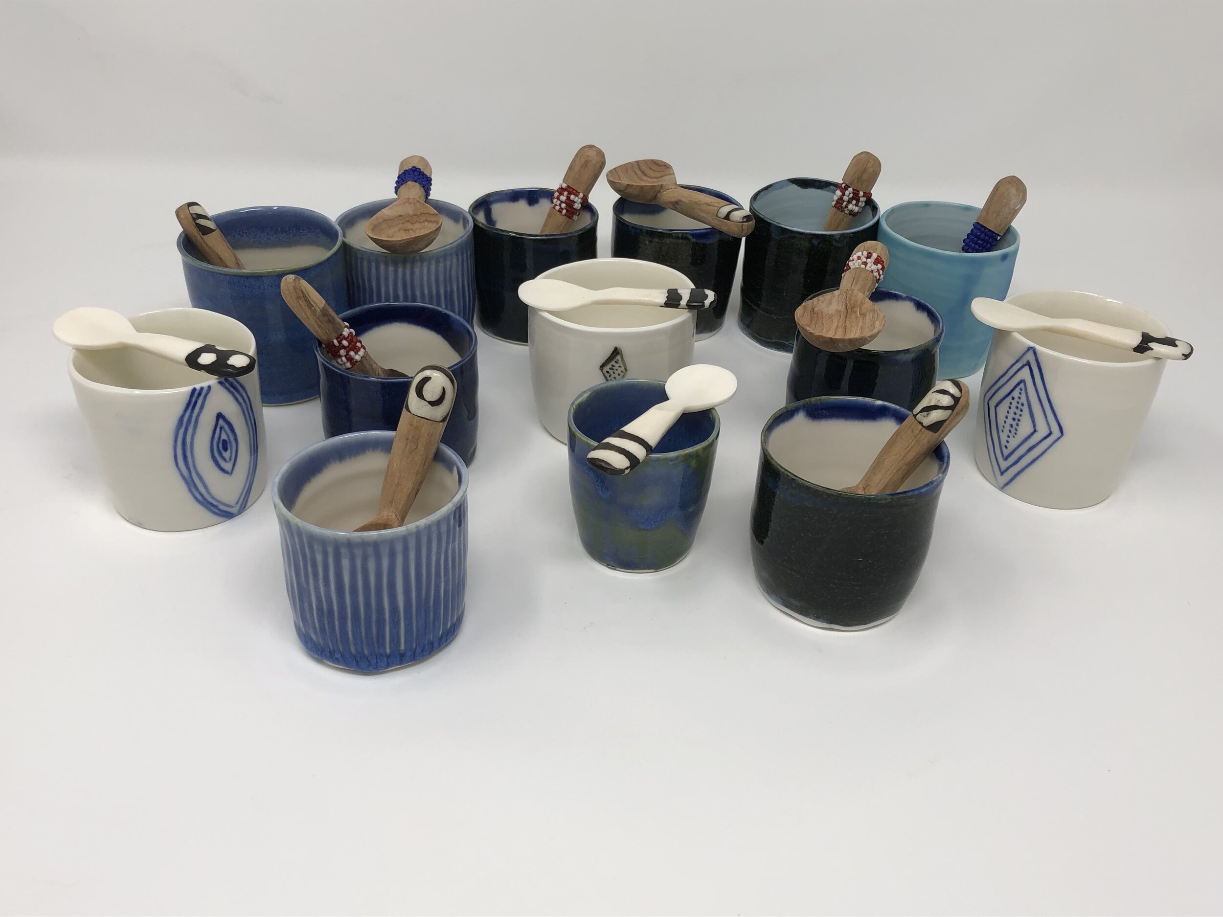 Very small pots with spoons.jpeg
