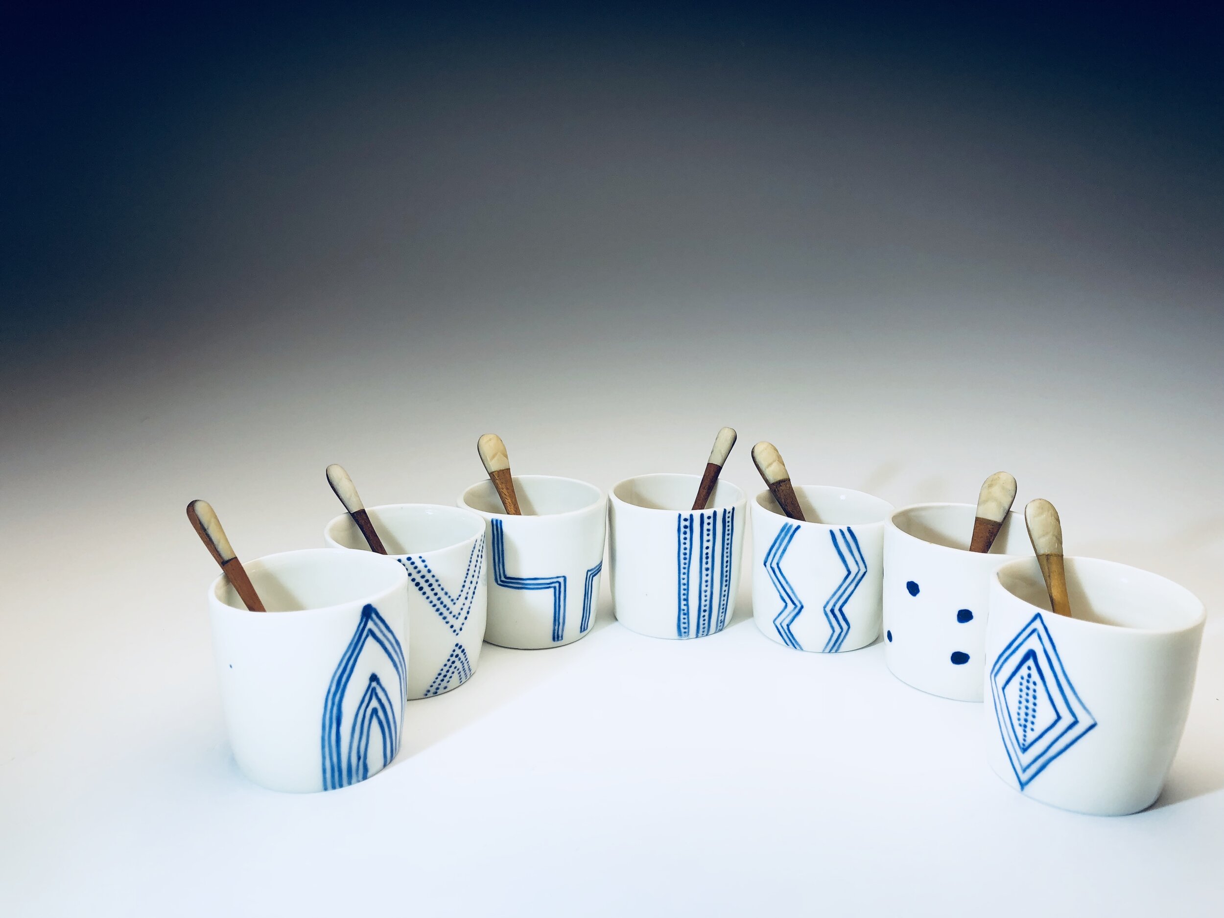 small salt pots with spoons.jpeg