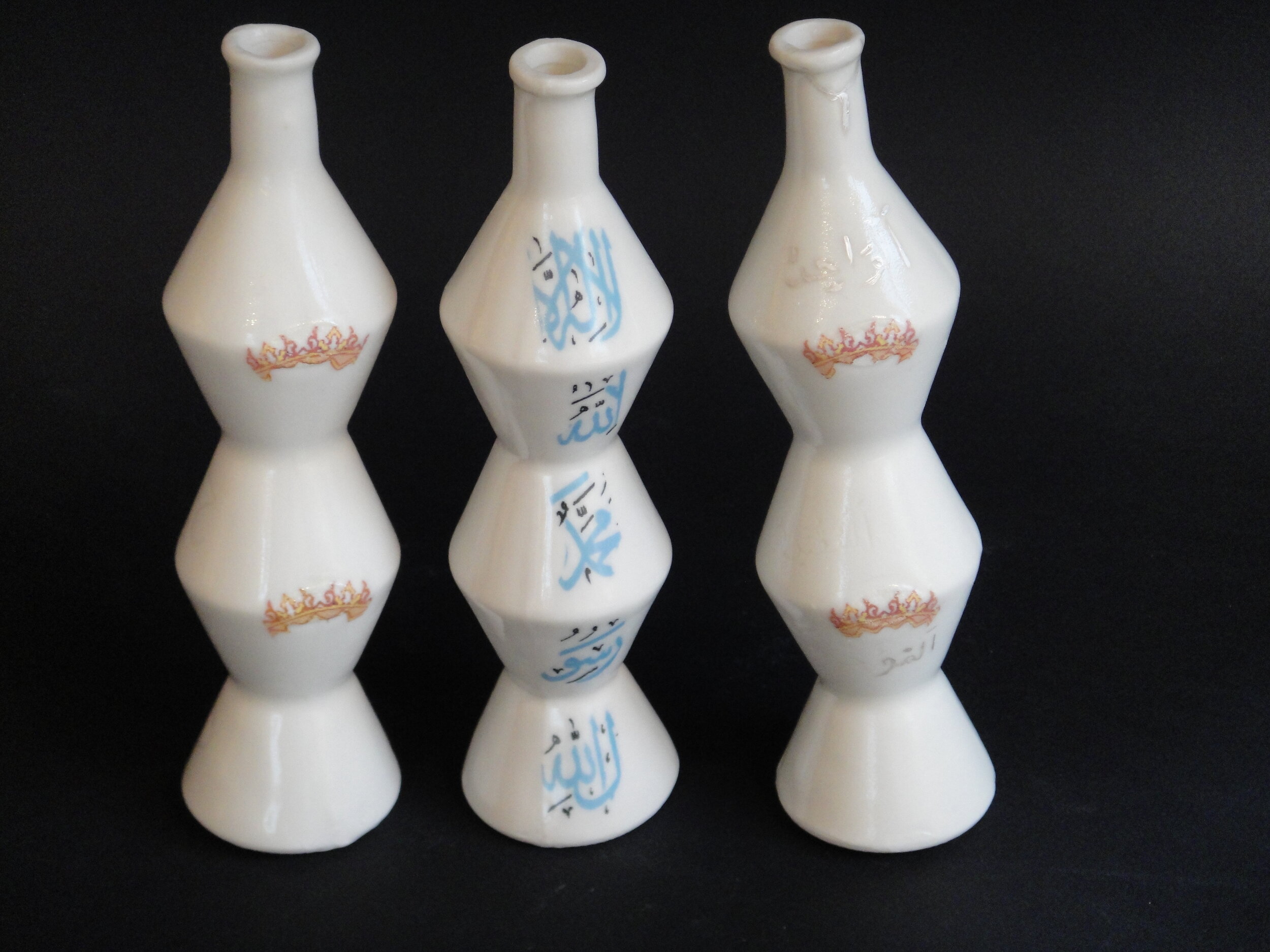 tall slip cast bottles.jpeg