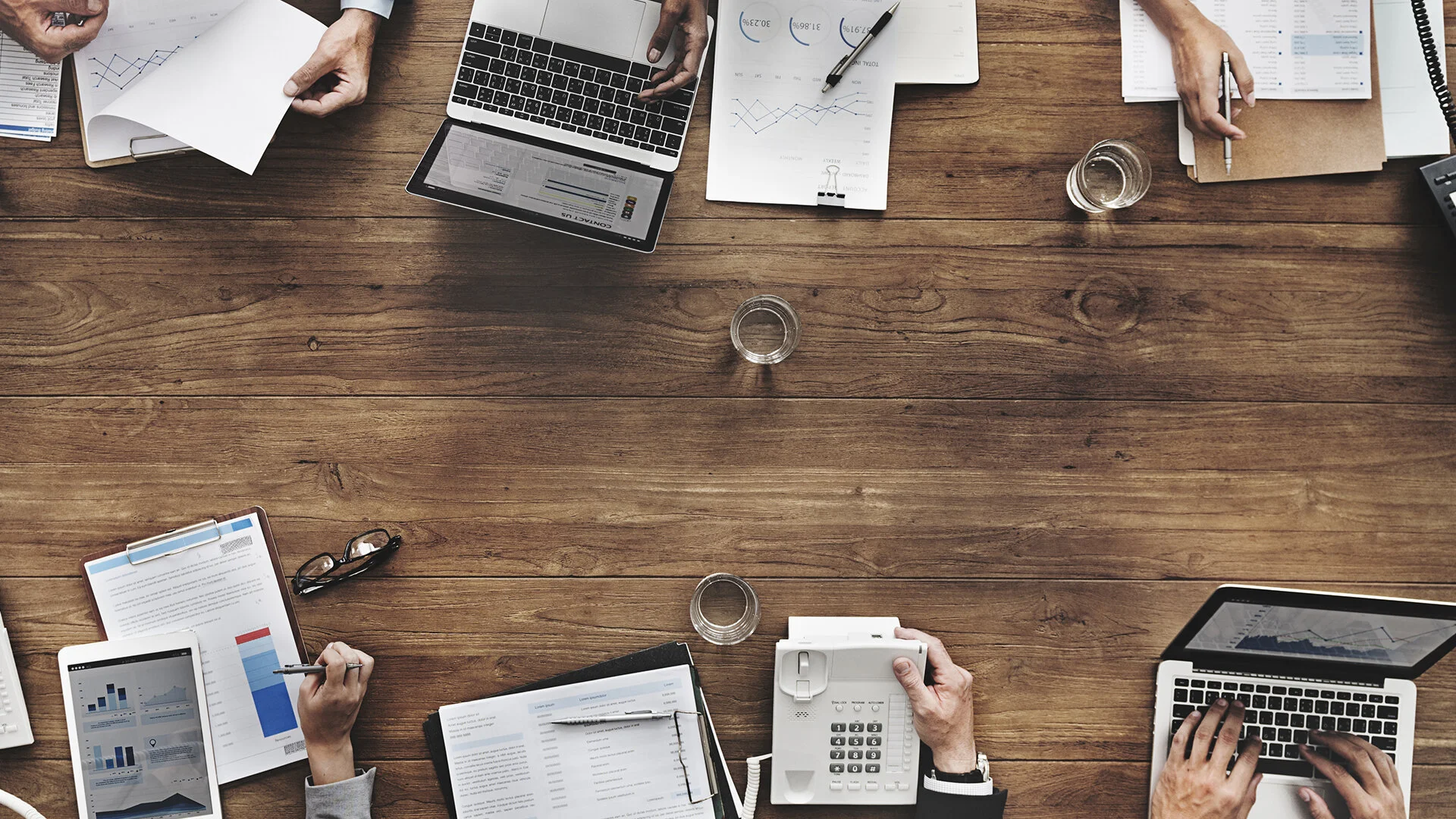 overhead-view-of-business-meeting-1920x1080.jpg