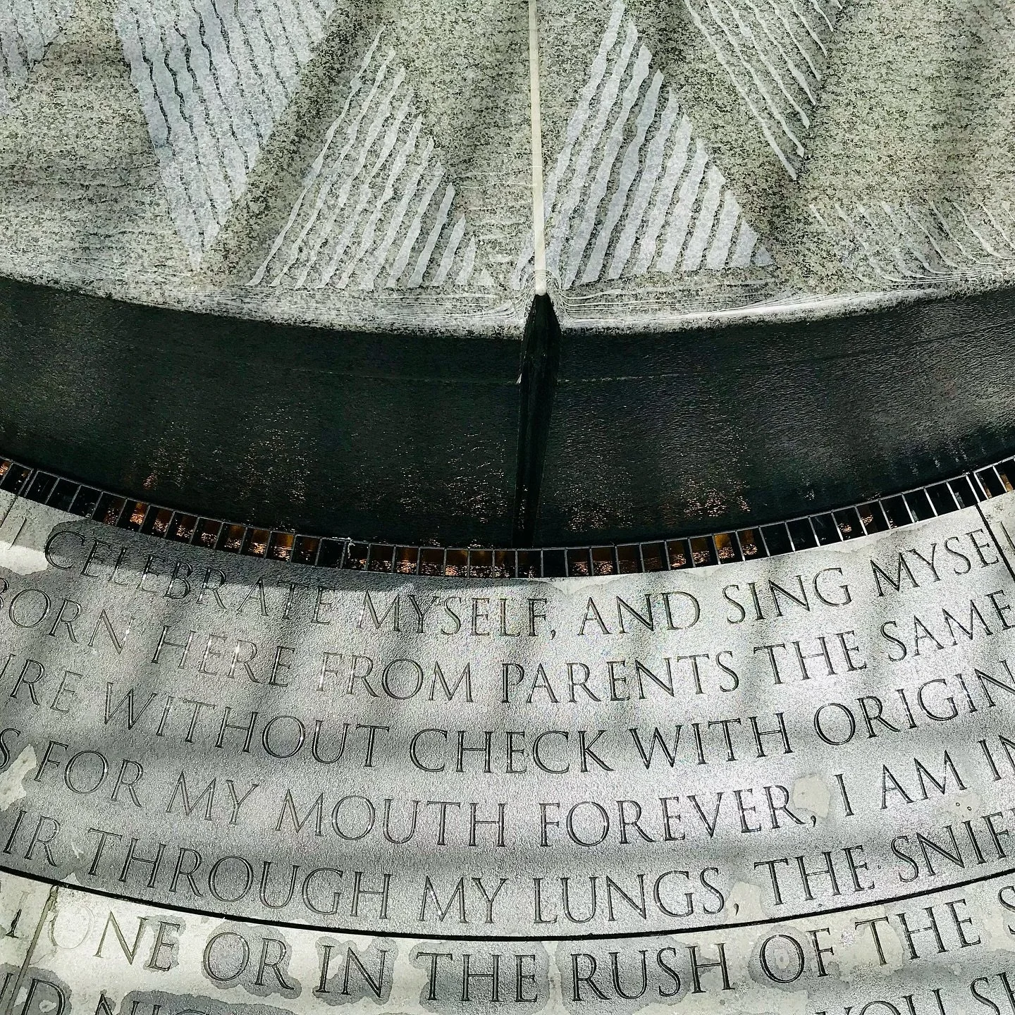 The white canopy above offers respite from the blazing sun. The glassy water of the fountain cools the air. The words &mdash; from &ldquo;Song of Myself&rdquo; by poet Walt Whitman &mdash; invite us to pause and remember: &ldquo;I celebrate myself, a