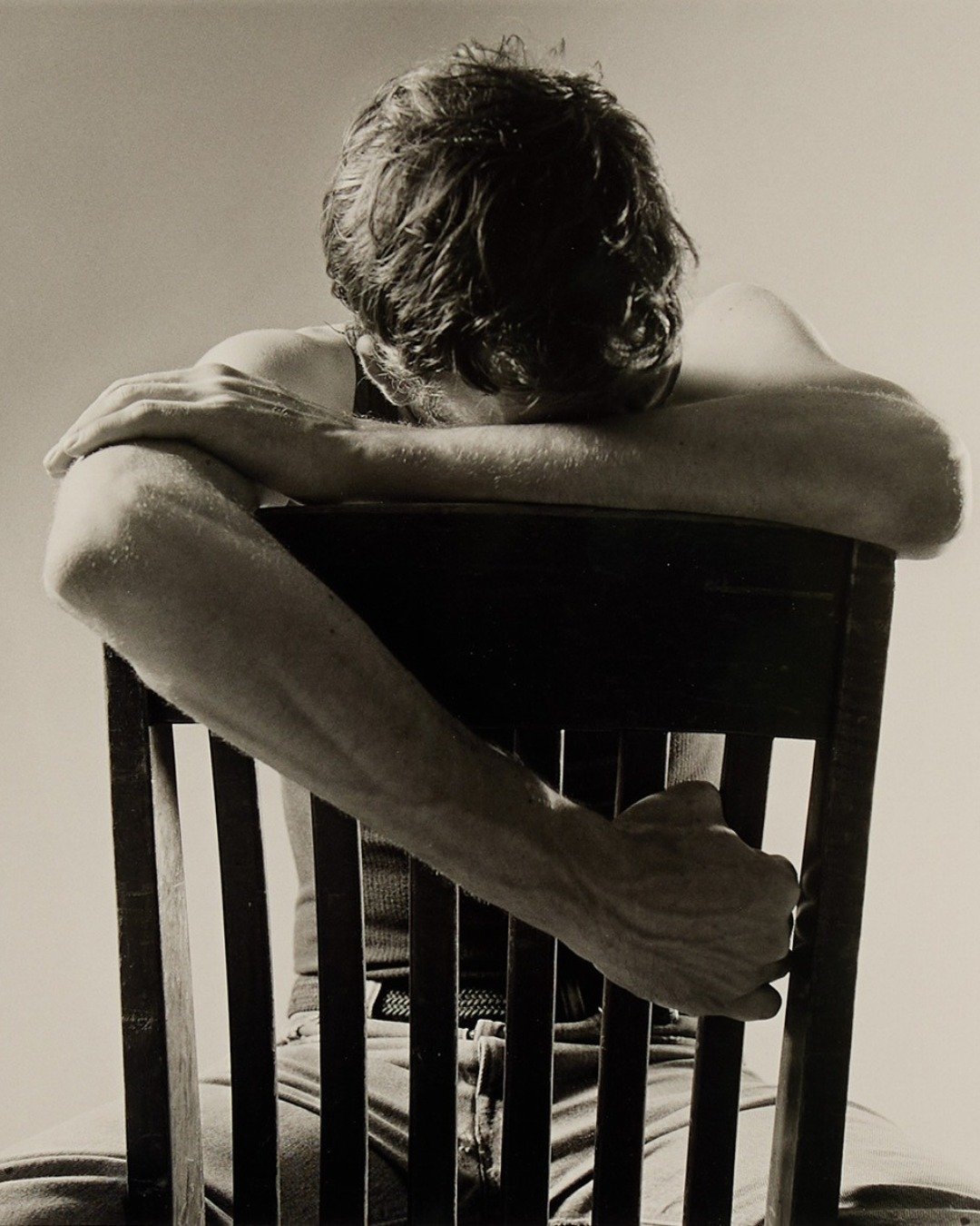In this profound portrait, Peter Hujar captures a moment of quiet, stark vulnerability in his frequent subject, the artist David Wojnarowicz.

Known for his uncompromising and deeply intimate approach to photography, Hujar documented the vital, inter