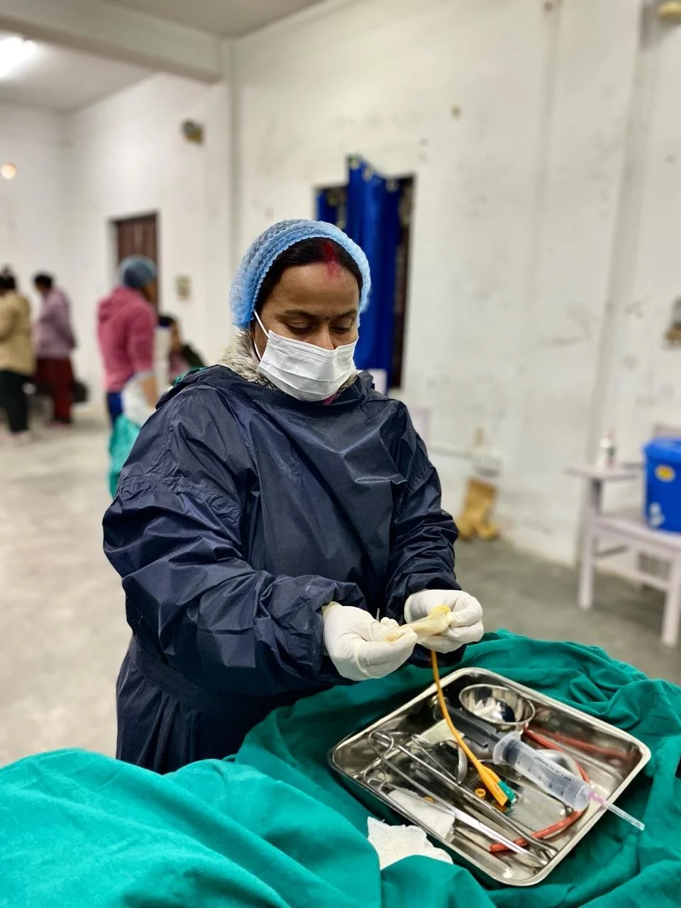 Preparing equipment during simulation session by trainee.jpeg