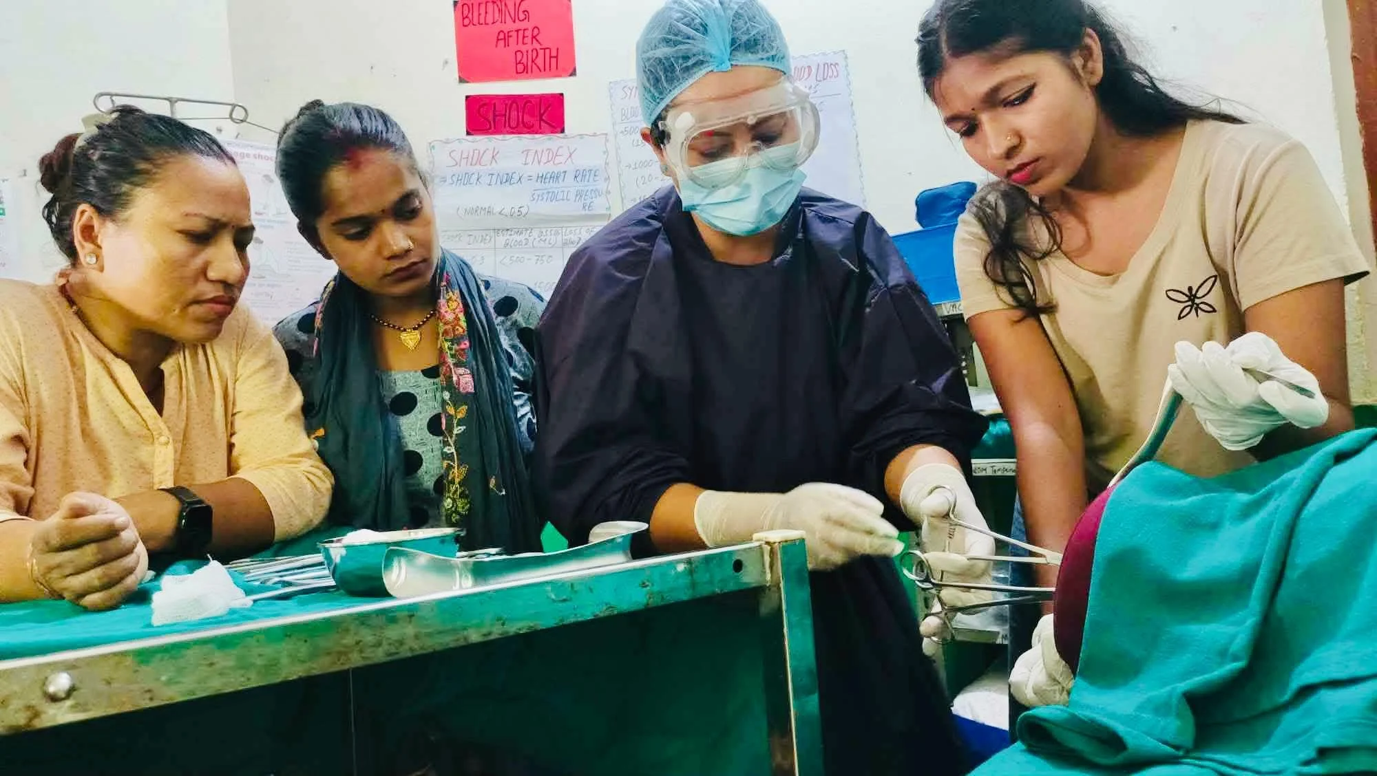 Mentees practicing Cervical Tear Inspection Procedure.jpeg