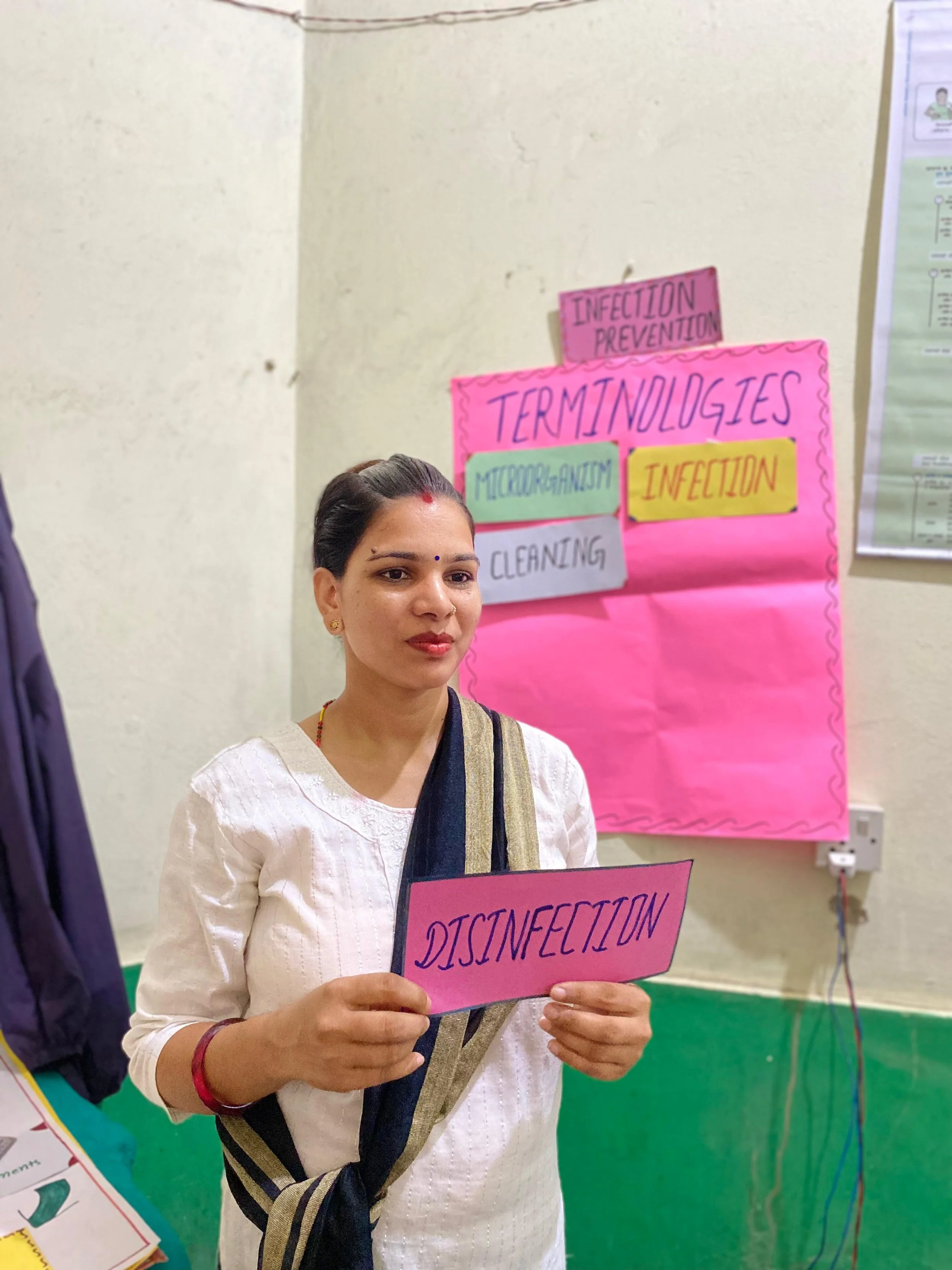 Mentor discussing key terminologies of Infection Prevention during Monthly session.jpeg