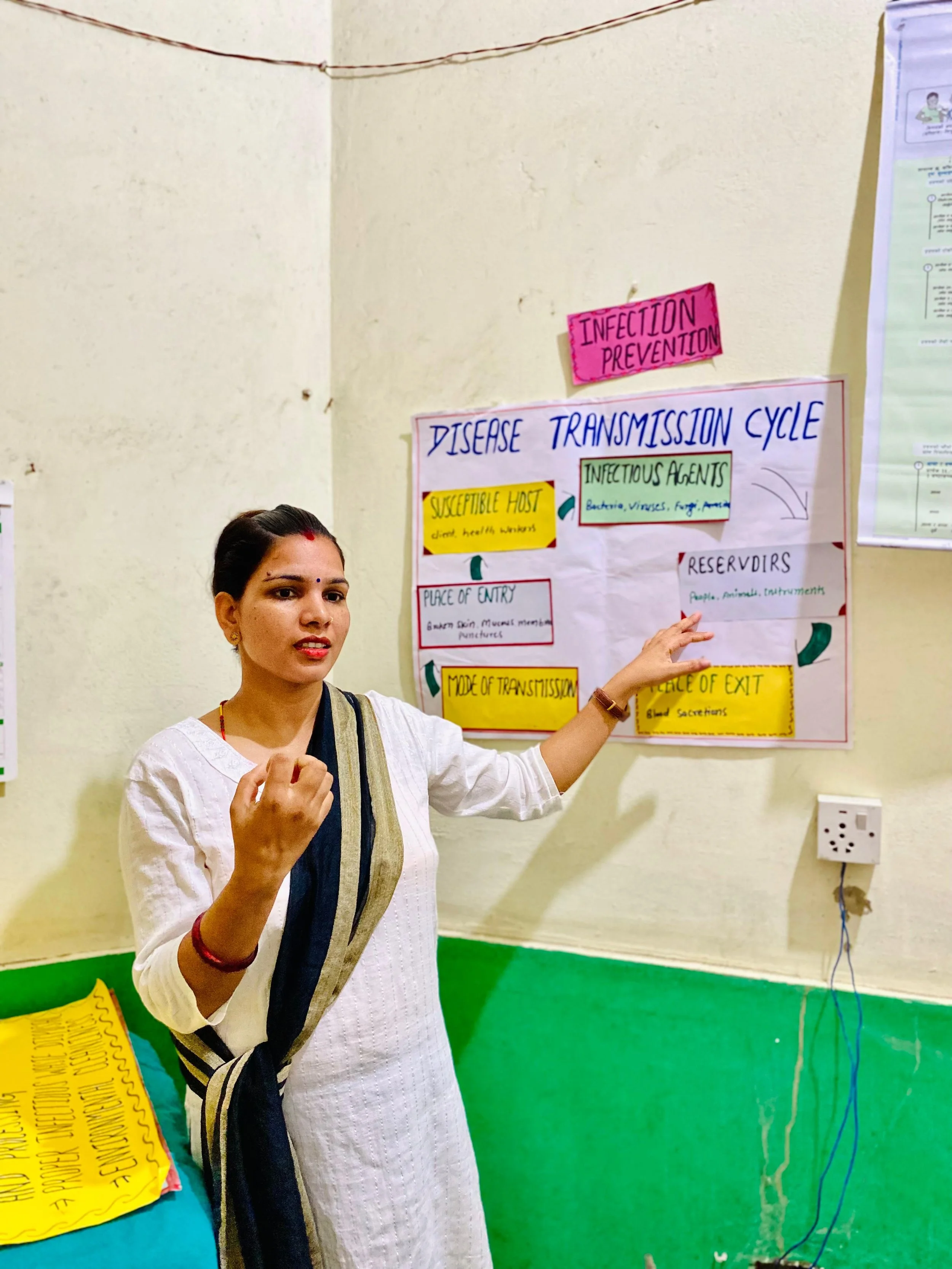 Mentor facilitating Monthly session on Infection Prevention Practice.jpeg
