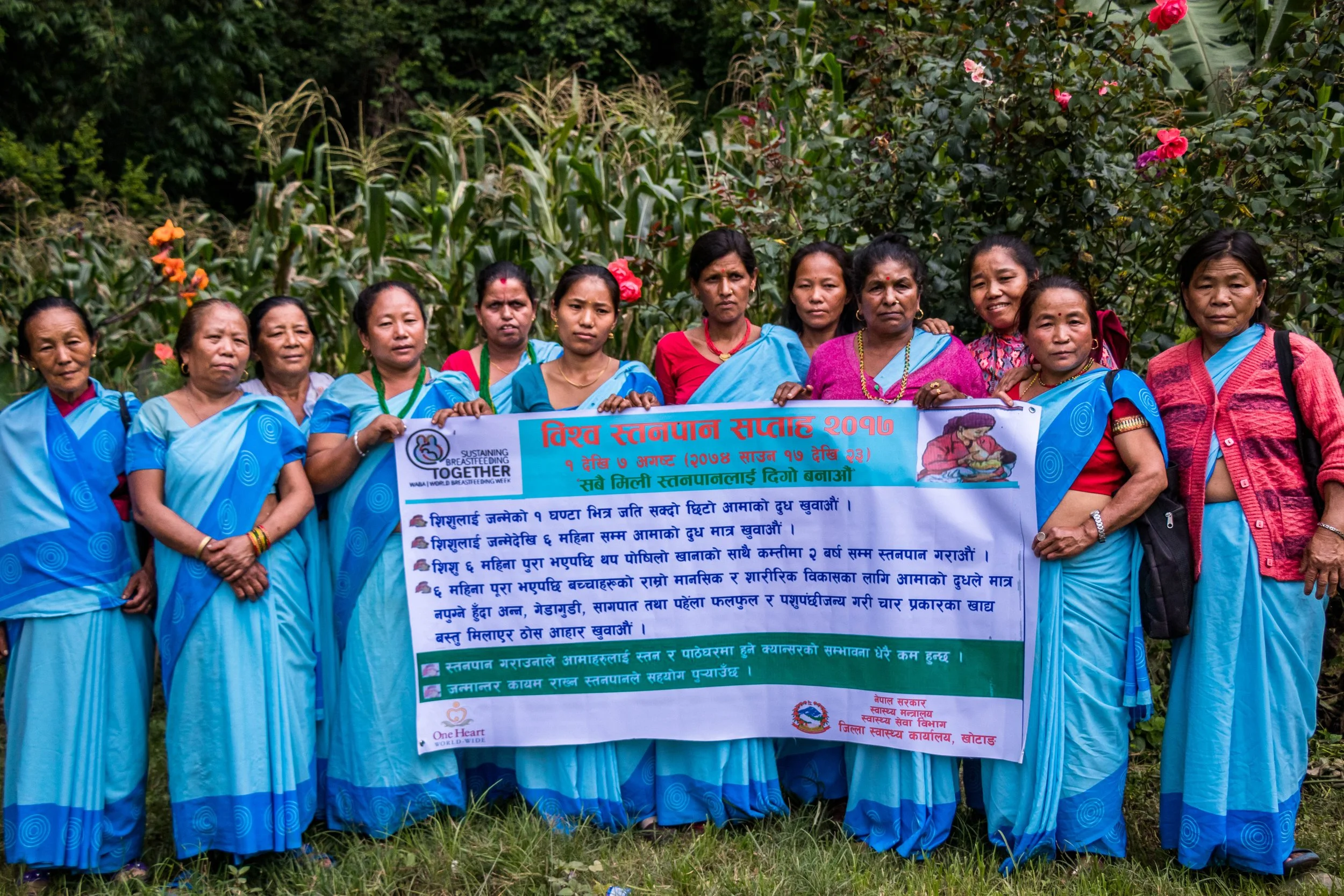 Female Community Health Volunteers holding a banner after completion of an MNH training in 2018 in Nepal.