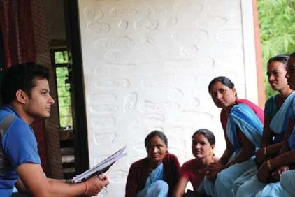 Our now Co-CEO, Surya Bhatta, in 2013 out in the field working with Female Community Health Volunteers where he trained them to become master trainers.
