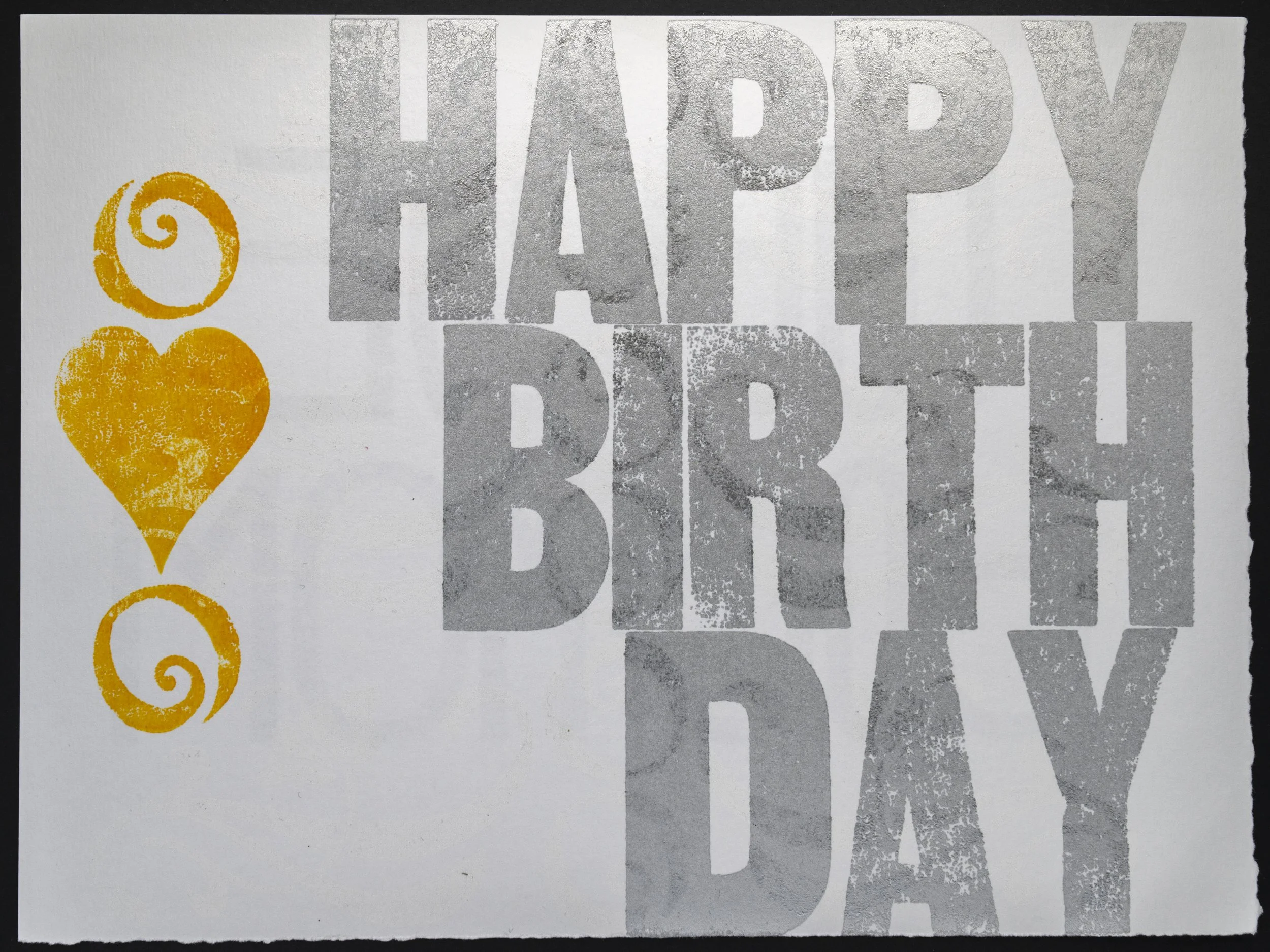 Birthday love. Everybody should get it. The back side says, We Love You Mom. 