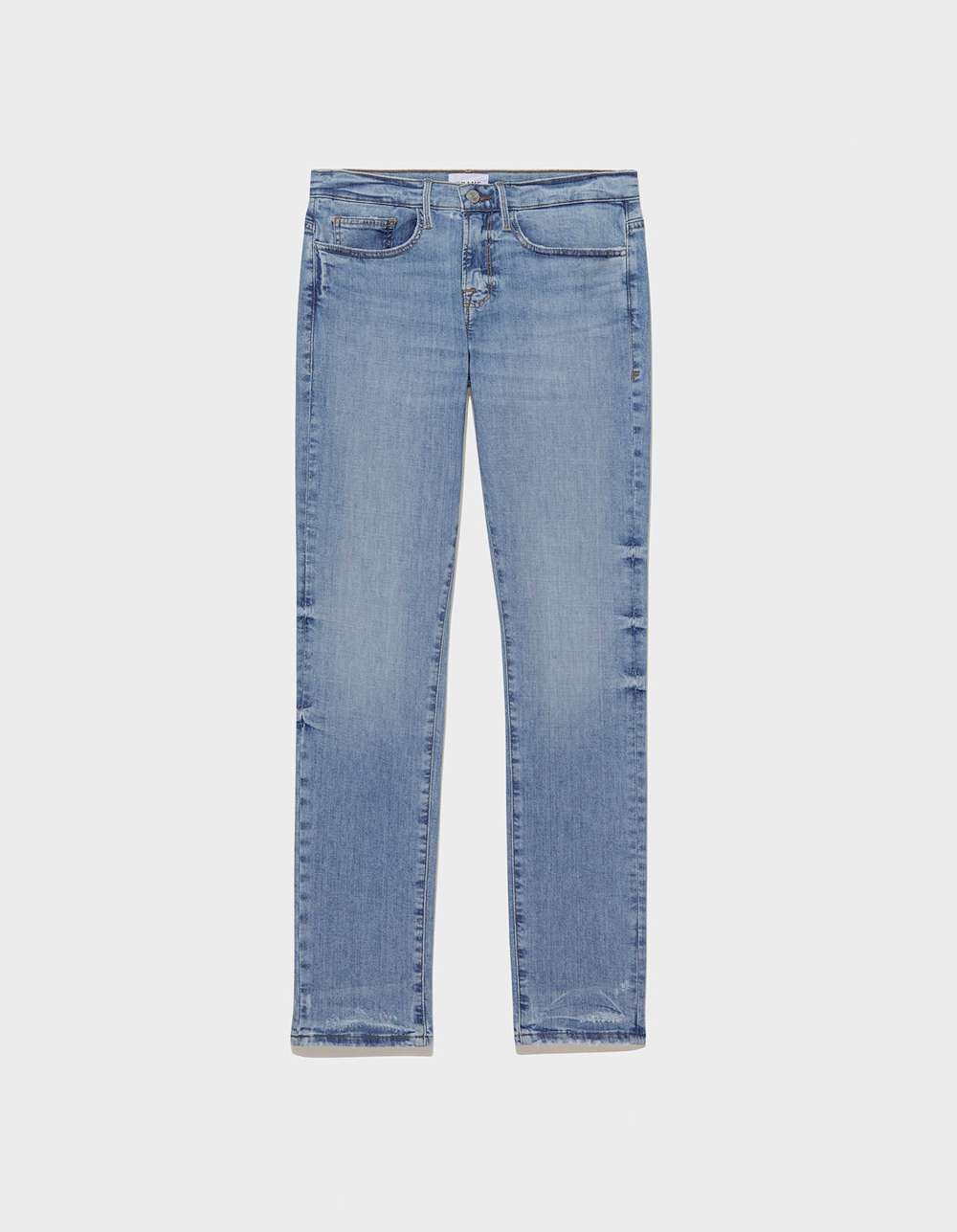    L'Homme Slim Degradable in Crestwood    Our signature slim-fit, mid-rise denim in a medium-blue indigo wash. Crafted from degradable premium Italian denim, this fit is made with organic cotton and ROICA degradable stretch yarn for a comfortable, E