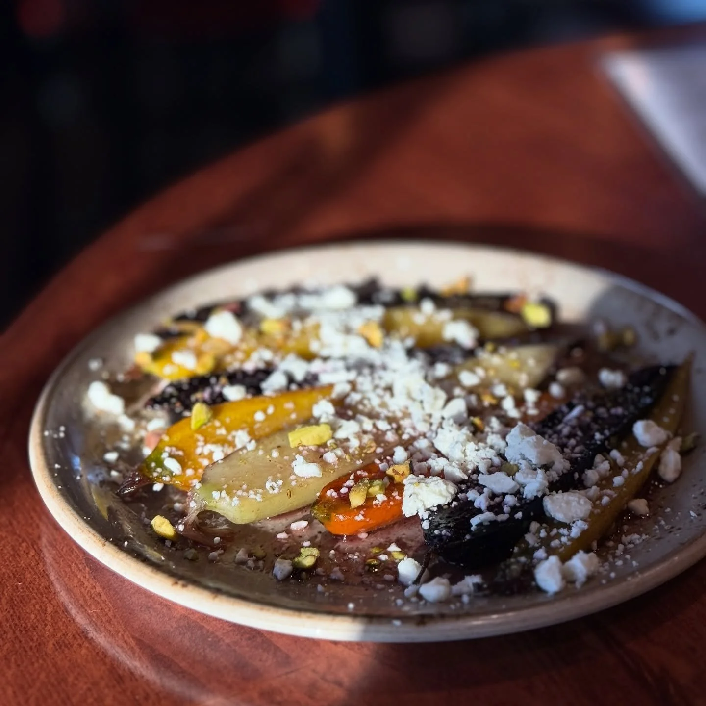 Carrots are having their main-character moment. 🥕💁‍♂️
Maple-garlic roasted and finished with feta + pistachios — this side is stealing the show.
Here for a limited time… unless you convince us otherwise. 😉