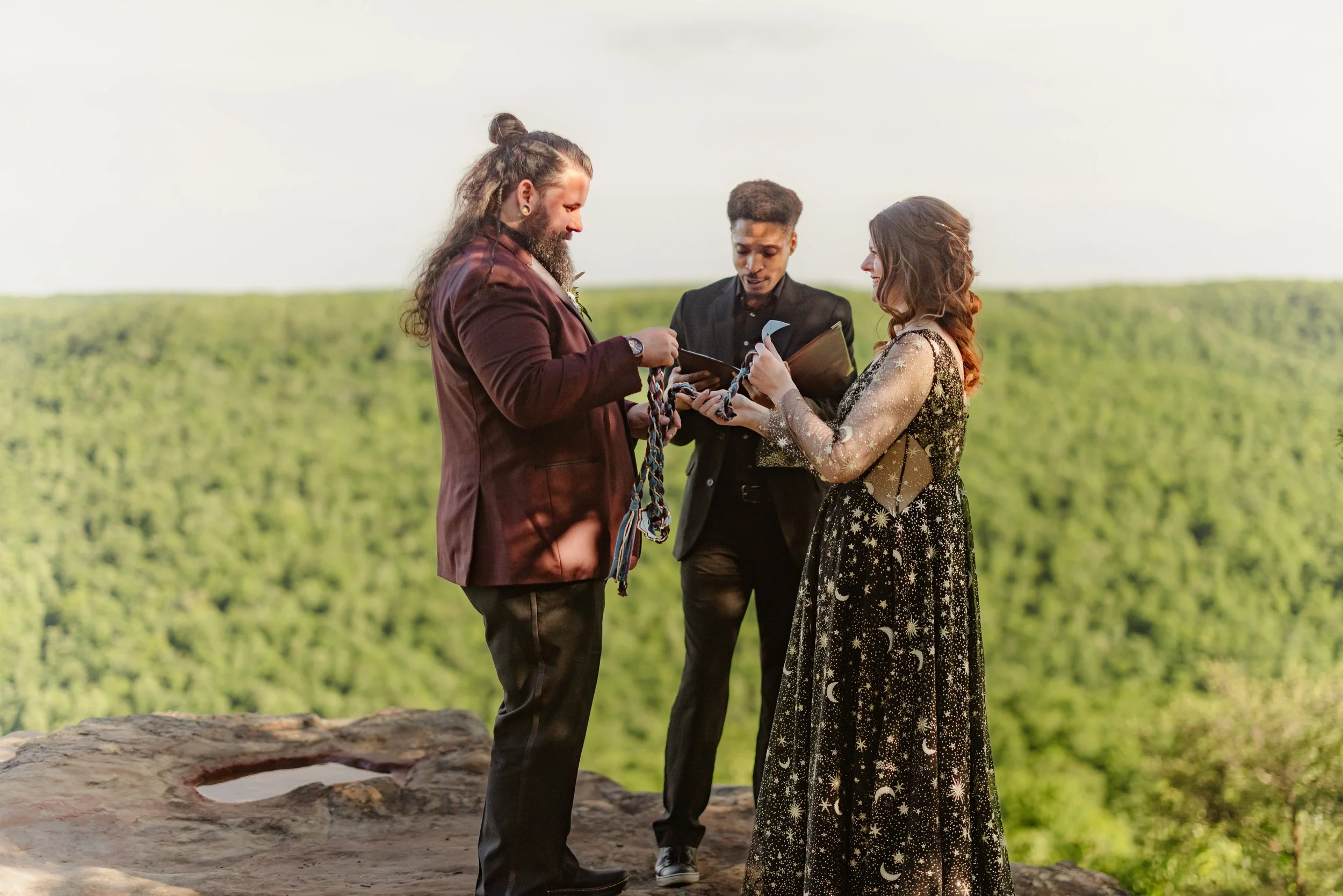 Couple eloping on mountain cliff in Middle Tennessee