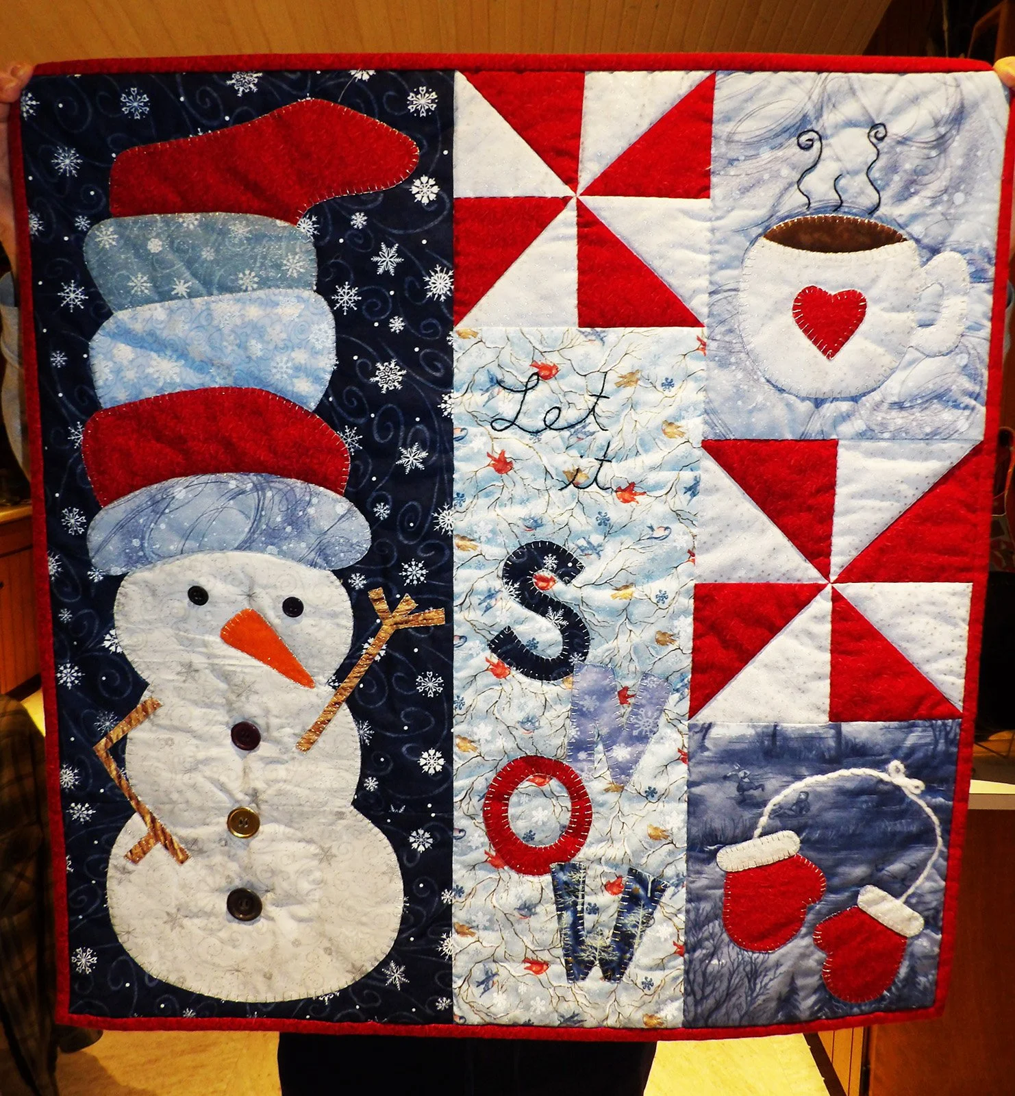 Snowman Collage, Other, 27x28: Lindy Siebert, Bethesda Mennonite Church

Red blue and white snowman collage wall hanging.