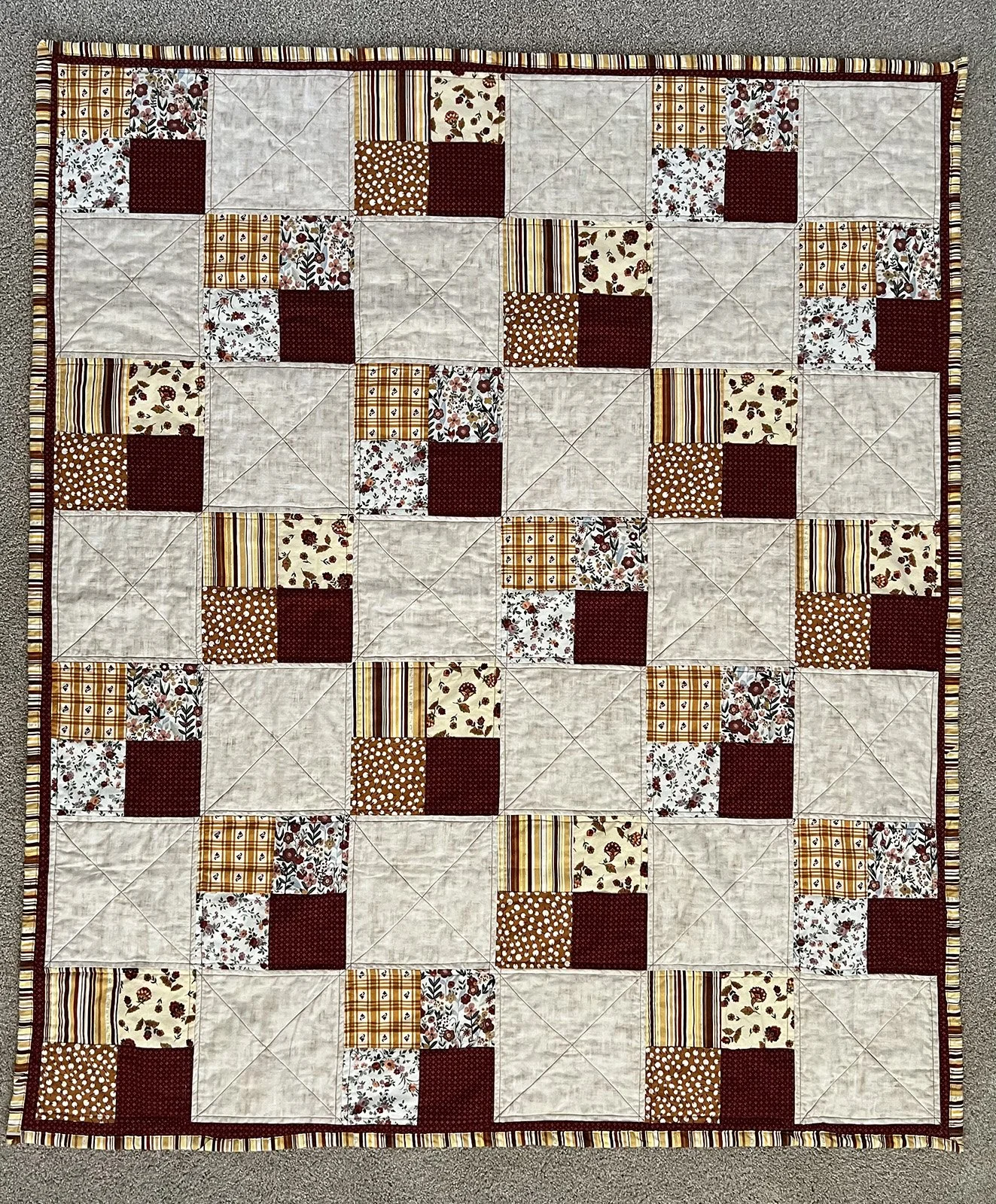 Autumn Comfort, Quilt, Lap/Throw, 51x60: Jac & Sugar Thiessen, Non-Affiliated

Four-patch design homemade Quilt made with various autumn colors.