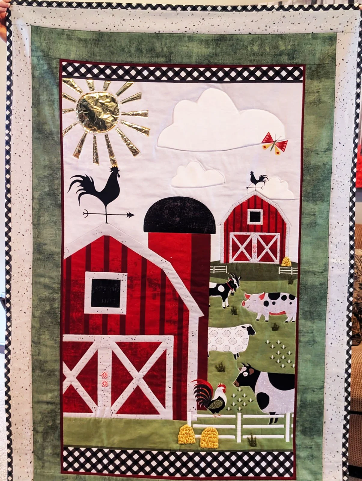 A Day on the Farm, Other, 35x53: Pam Kunzman, First Mennonite Church, Beatrice

Wall Hanging. A panel that was embellished with outline stitching, buttons, puffy foam, mylar, and embroidery.