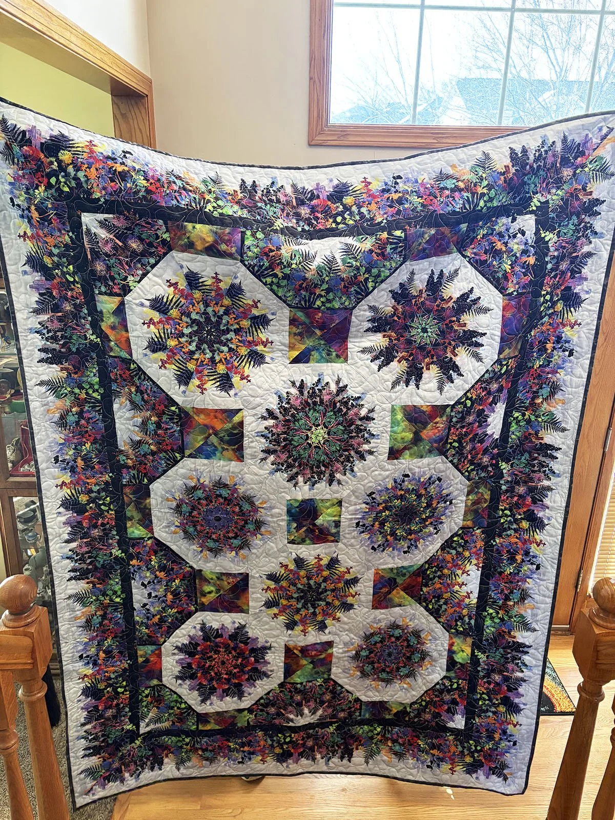 Kaleidoscope, Quilt, Twin, 64x86: Rynette Friesen, Bethesda Mennonite Church

Kaleidoscope pattern by Jason Yenter for “In The Beginning Fabrics “. Urban jungle fabric. Pieced, quilted and donated by Rynette Friesen.