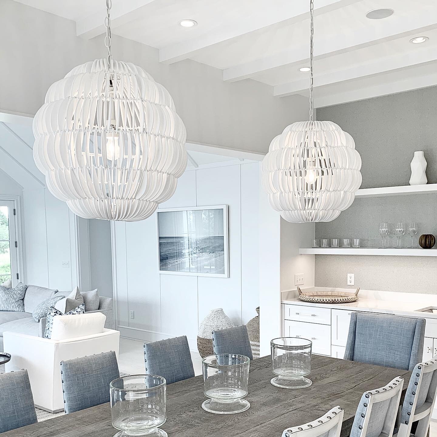 These soft white wood pendants are a perfect addition to this beautiful coastal dining room. 
.
.
.
.
#lightingdesign #pendant #diningroom #lighting #pendantlights #beachhouse #design #coast #homedecor #homedesign #nantucketstyle #nantucketlightshop 