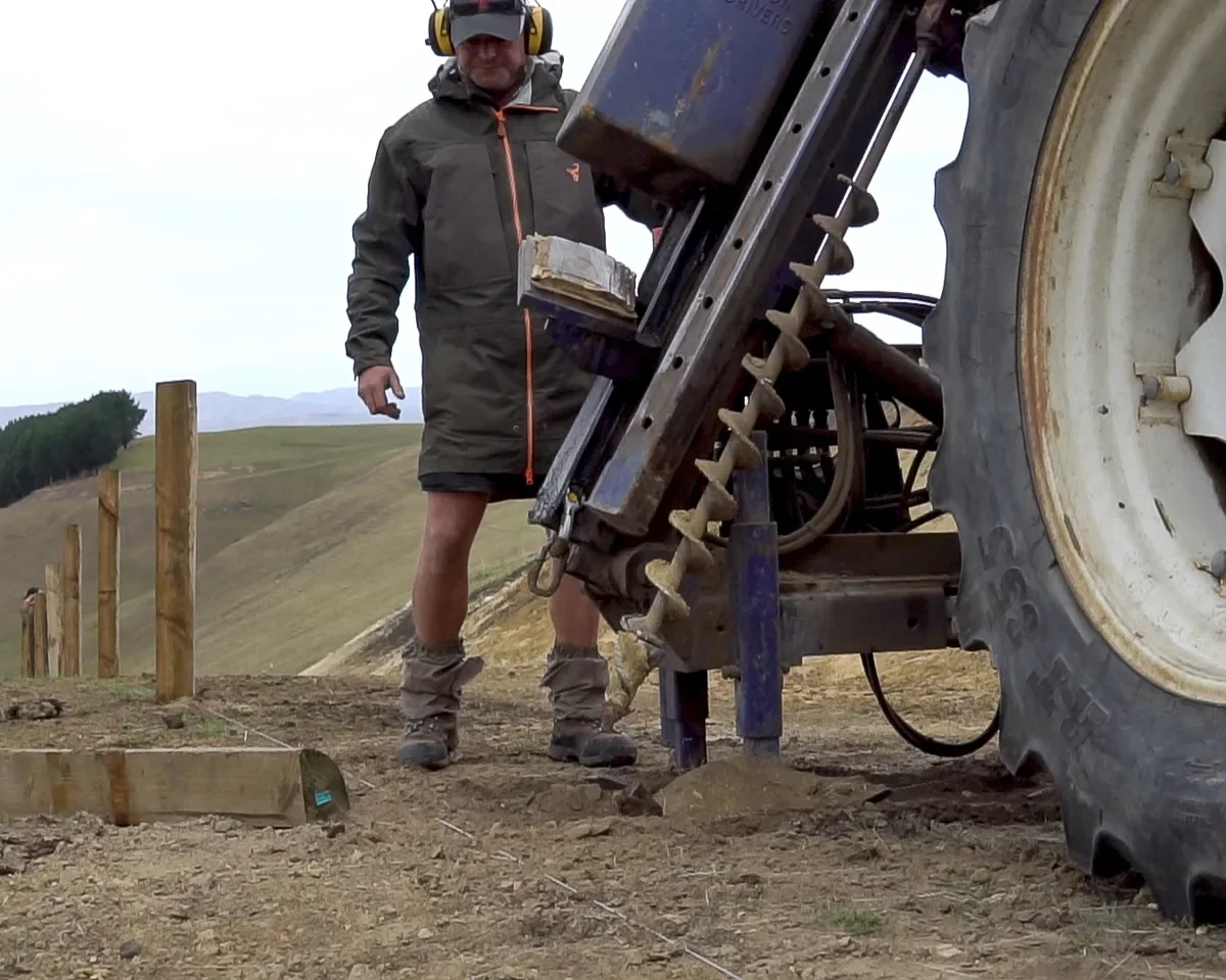 19-revolution-ss-operator-ear-muffs-auger-drilling-hillside-compressed.webp