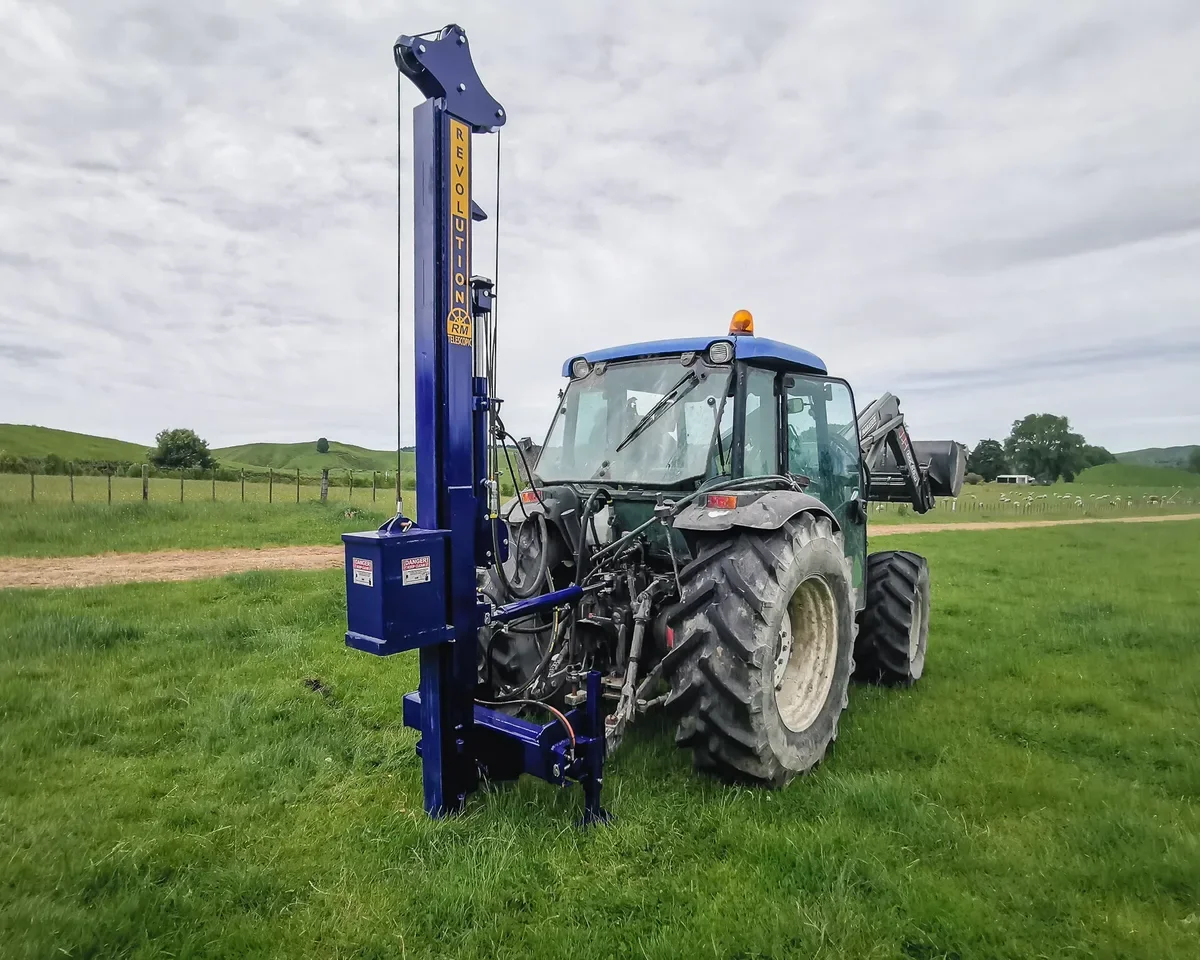 25-revolution-rm-tractor-front-loader-rear-view-green-paddock-compressed.webp