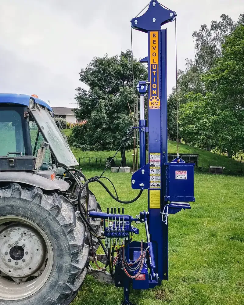 26-revolution-rm-post-driver-upright-tractor-side-view-portrait-compressed.webp
